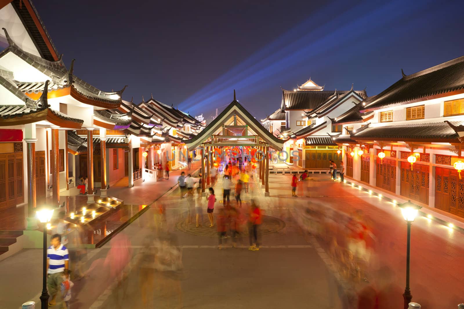 crowd walking in chinese ancient town at night