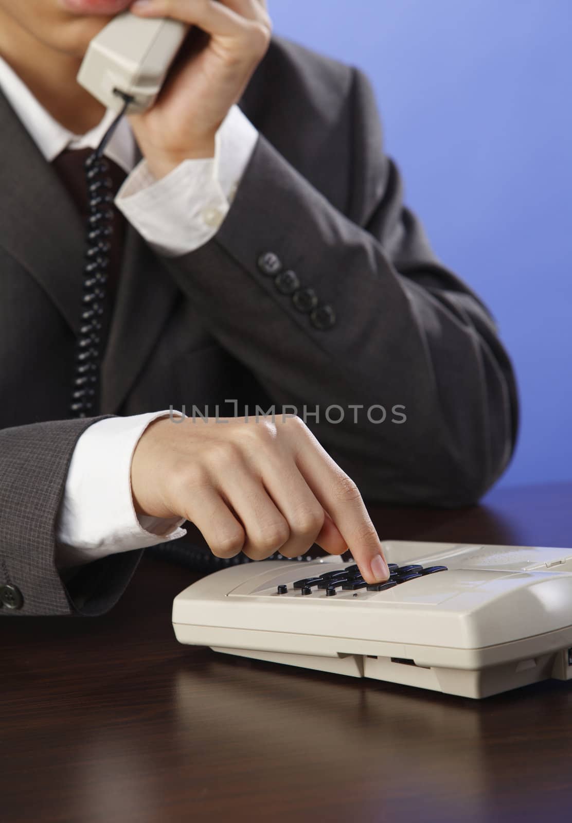 closeup of a man making phone call