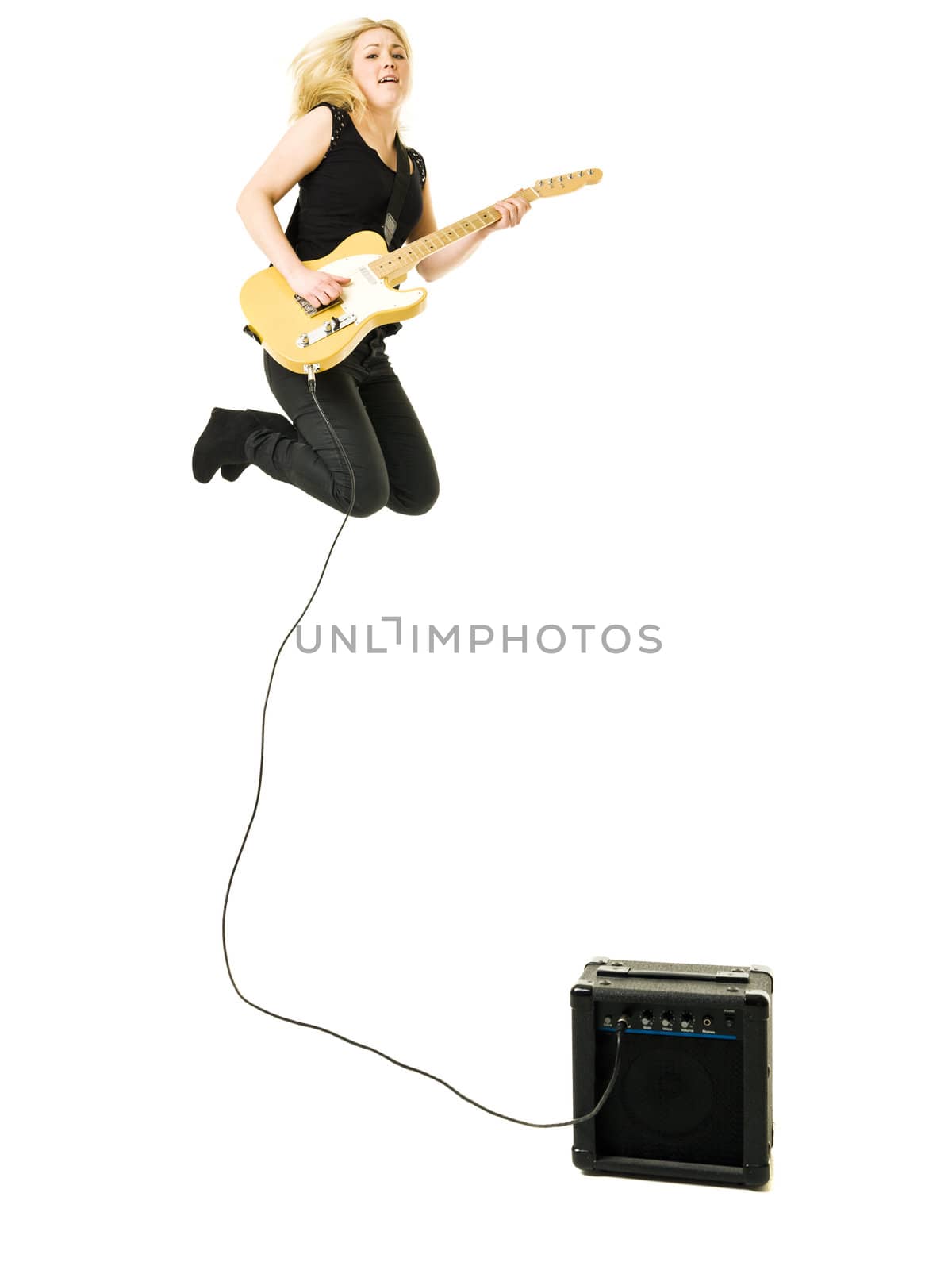 Young woman playing electric guitar isolated on white background