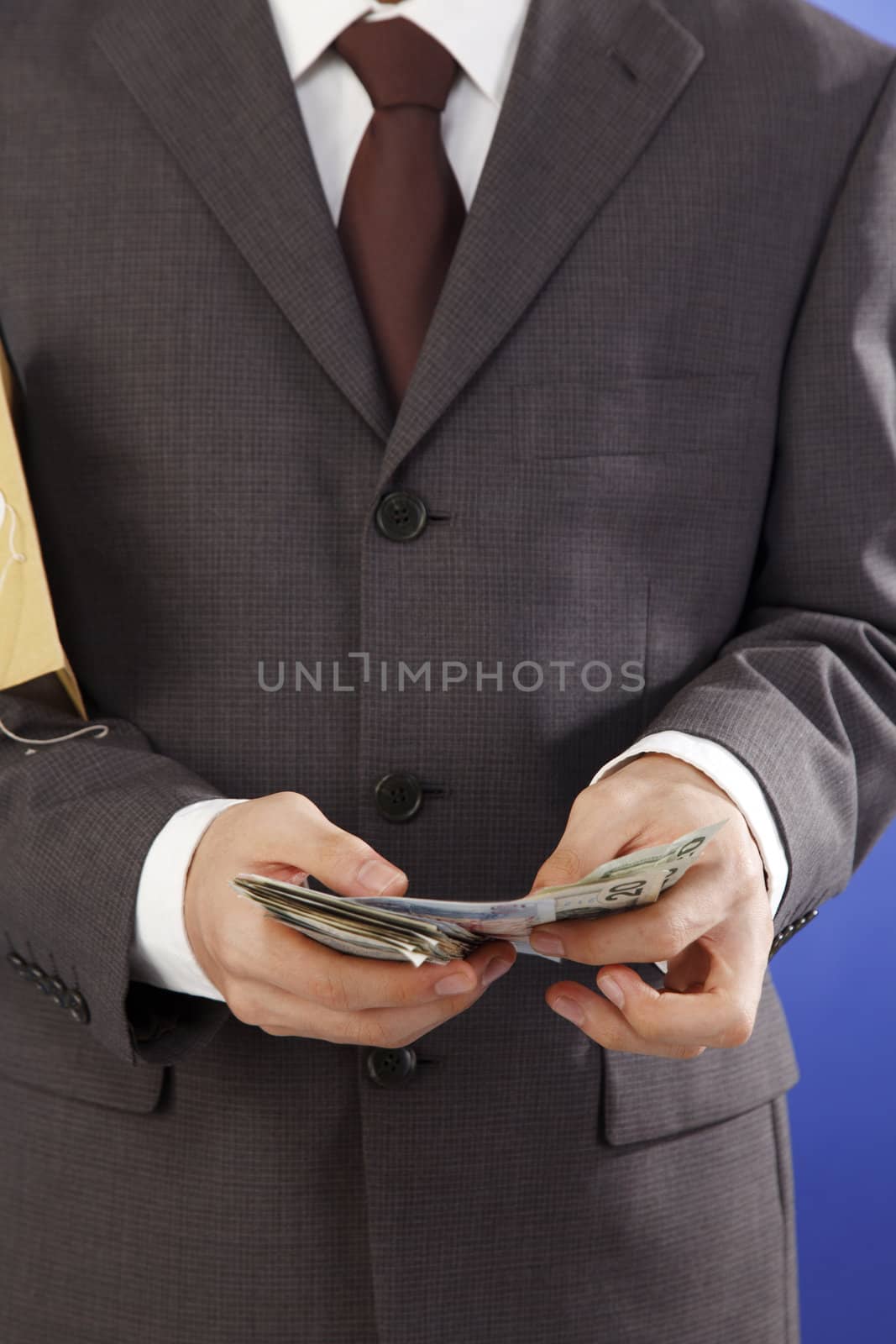 stock image of money in the hand