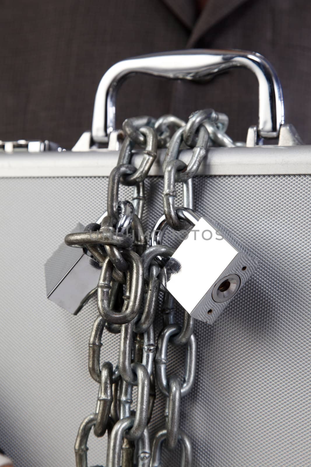 man holding the brief case with extra lock