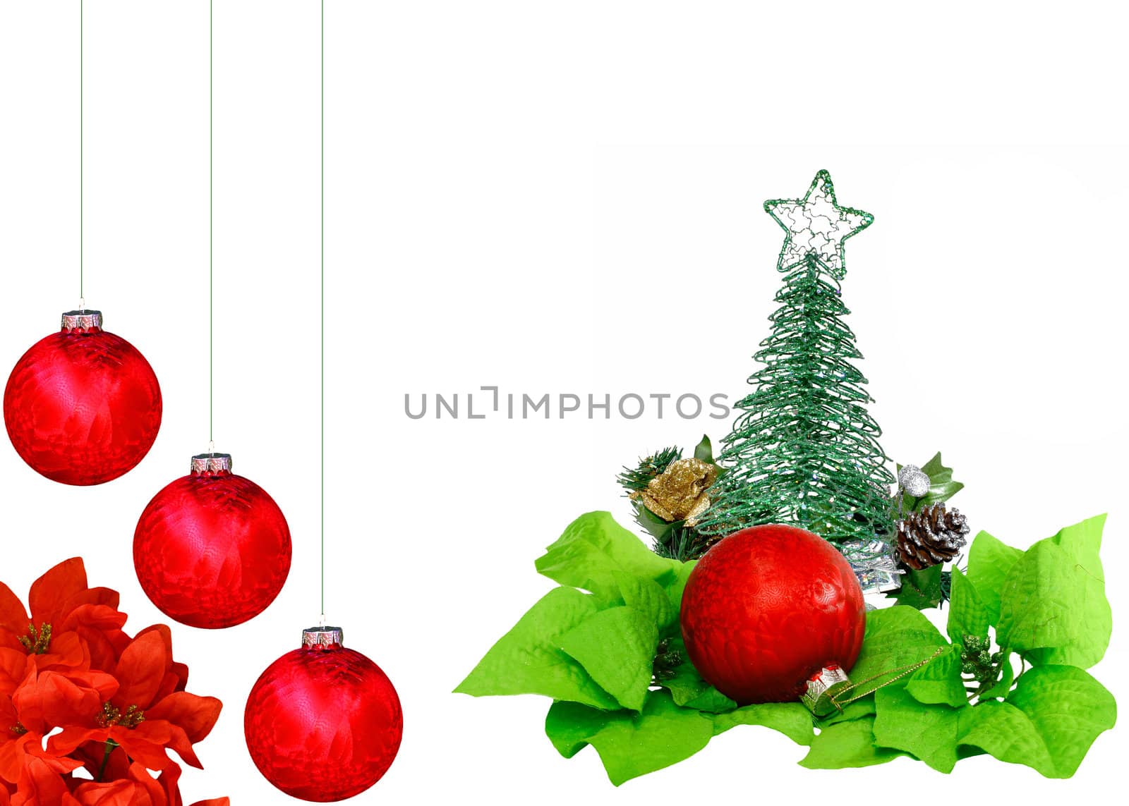 A Christmas design with red Christmas balls, poinsettia leaves, a Christmas tree and star a pine cone and a flower on white with room for your text
