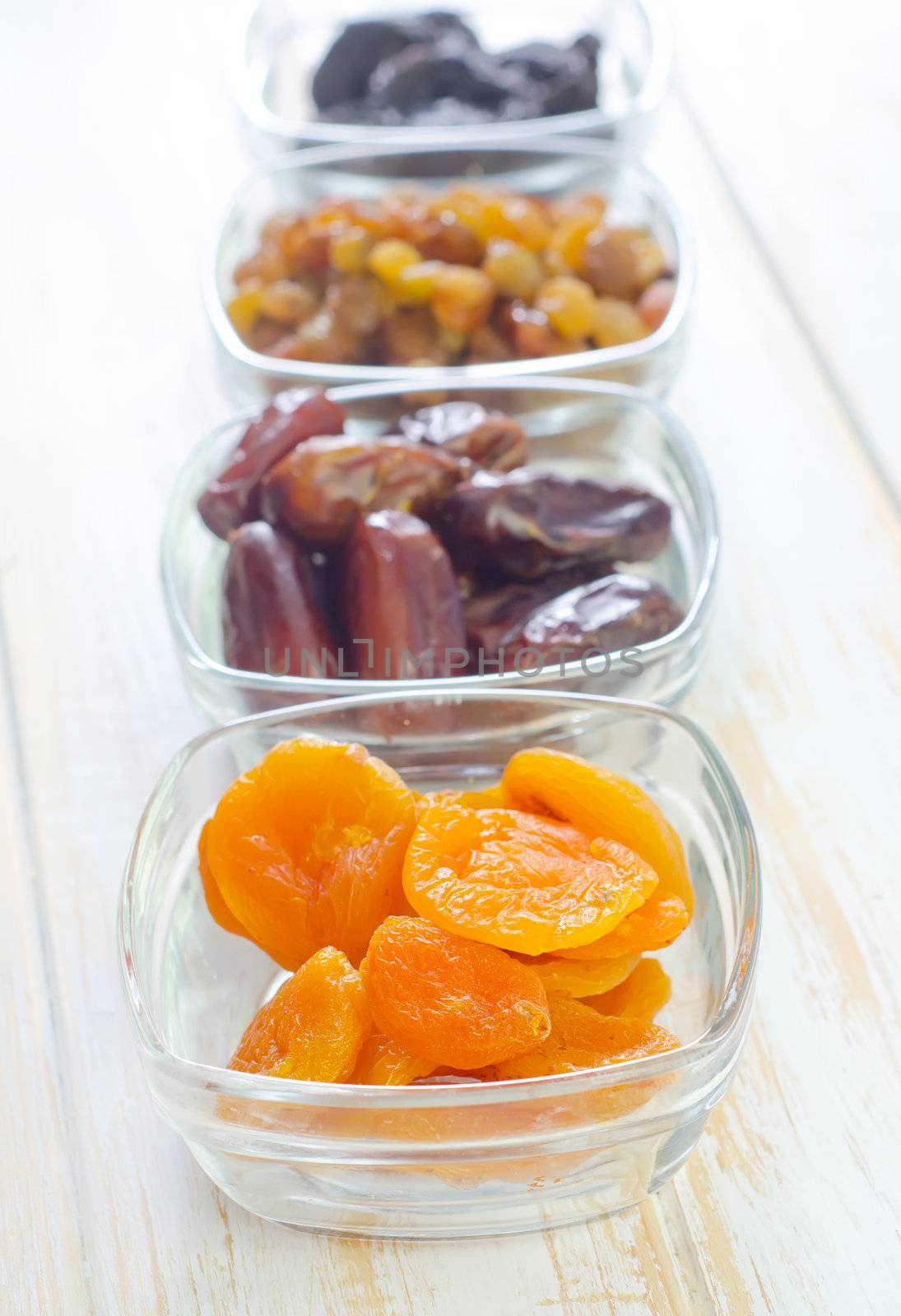 dried apricots, raisins and dates by tycoon