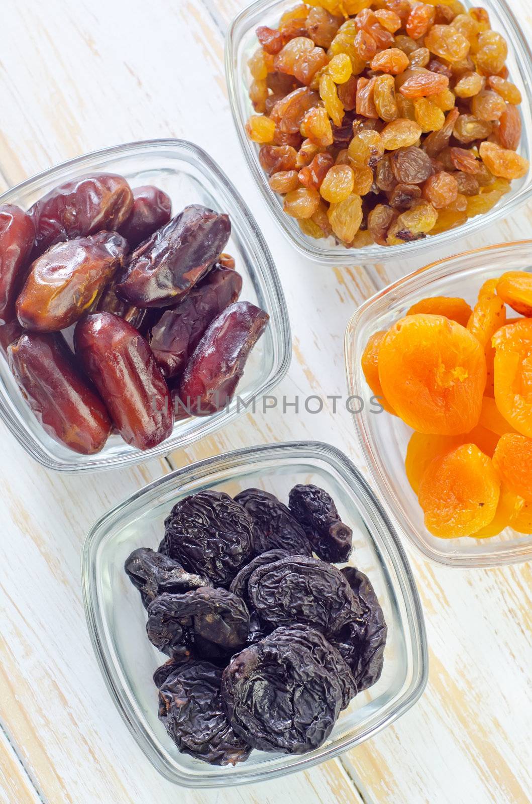 dried apricots, raisins and dates by tycoon