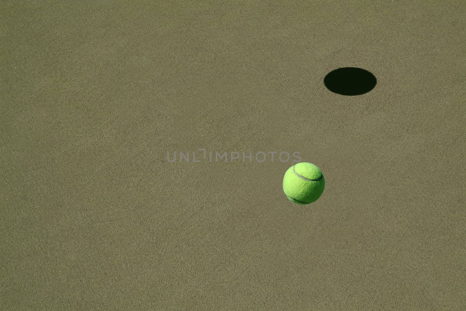 lonely Tennis Ball on a Sand Court
