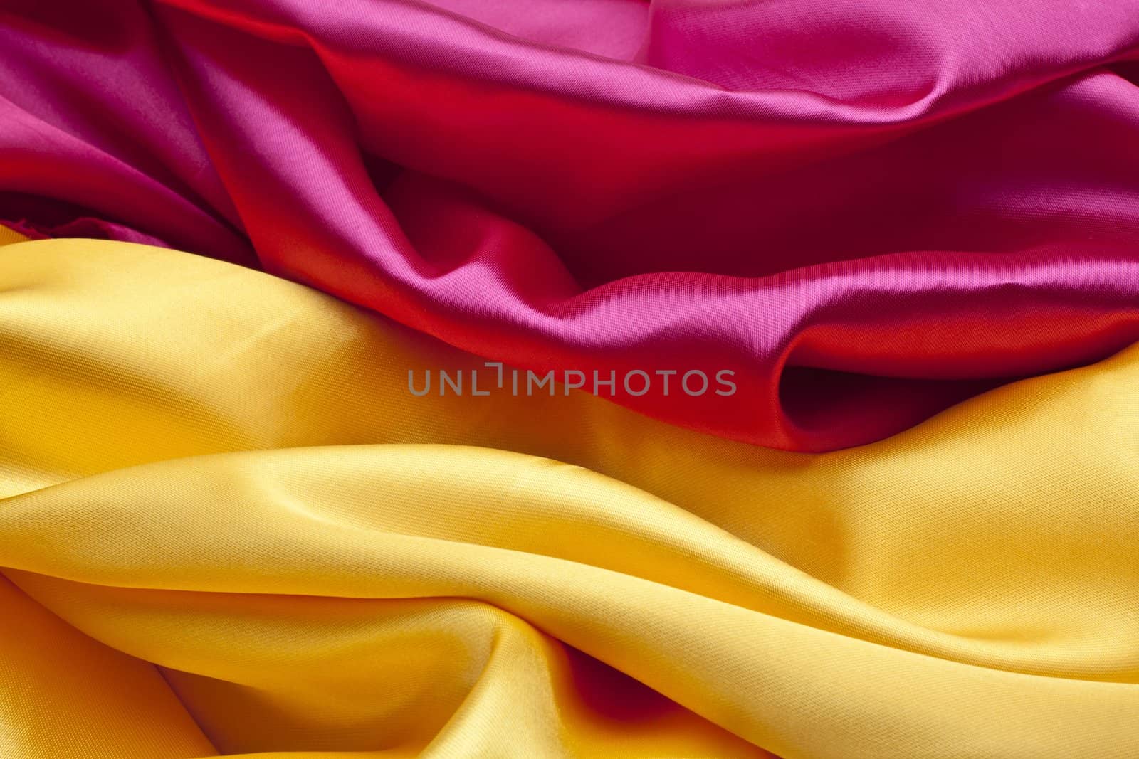 Silk background in pink and yellow colors