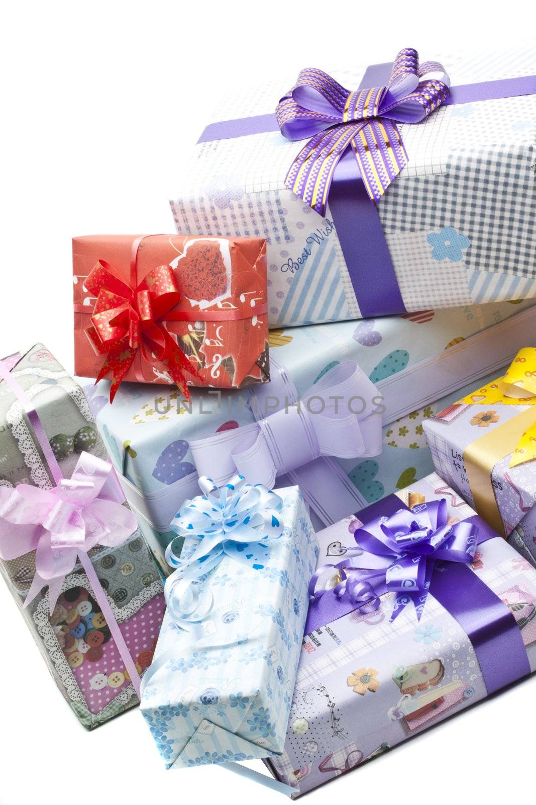 Colorful gifts box isolated by ozaiachin