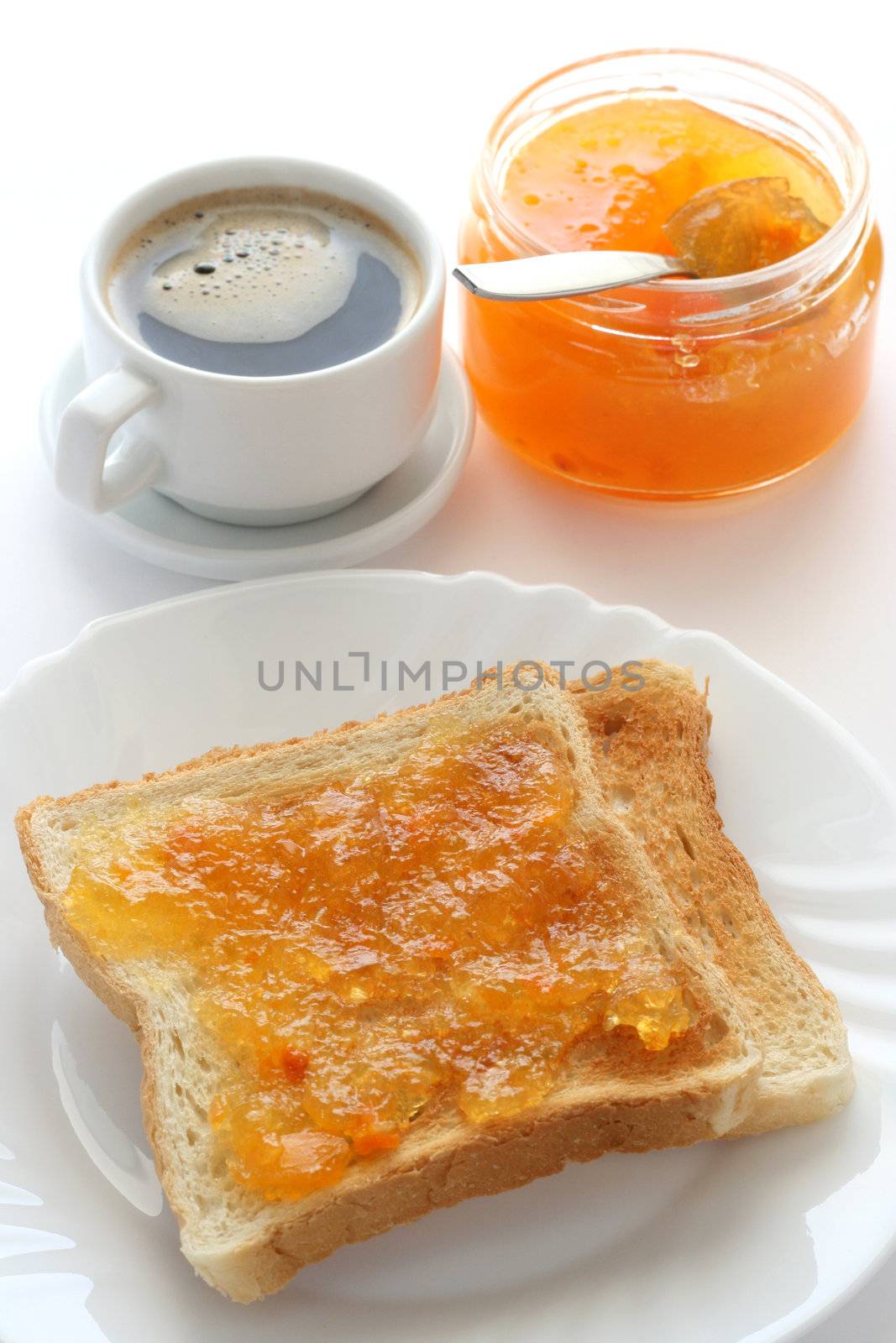 toast with jam and a cup of coffee by nataliamylova