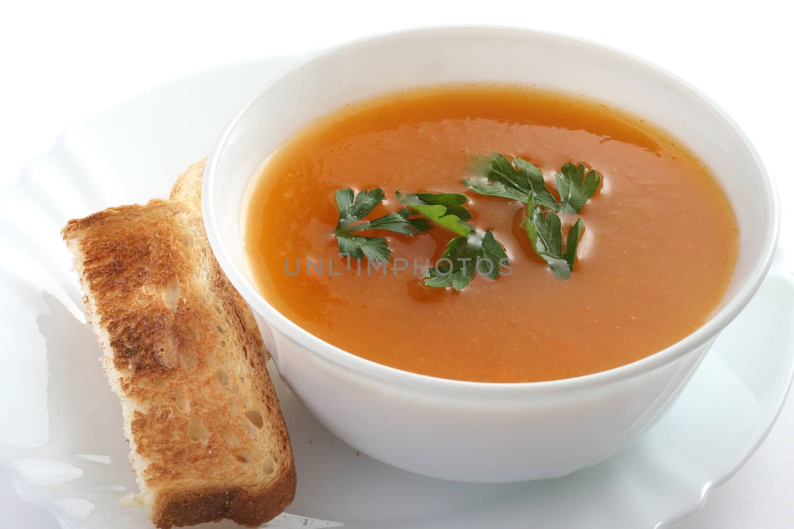 vegetable soup in white bowl