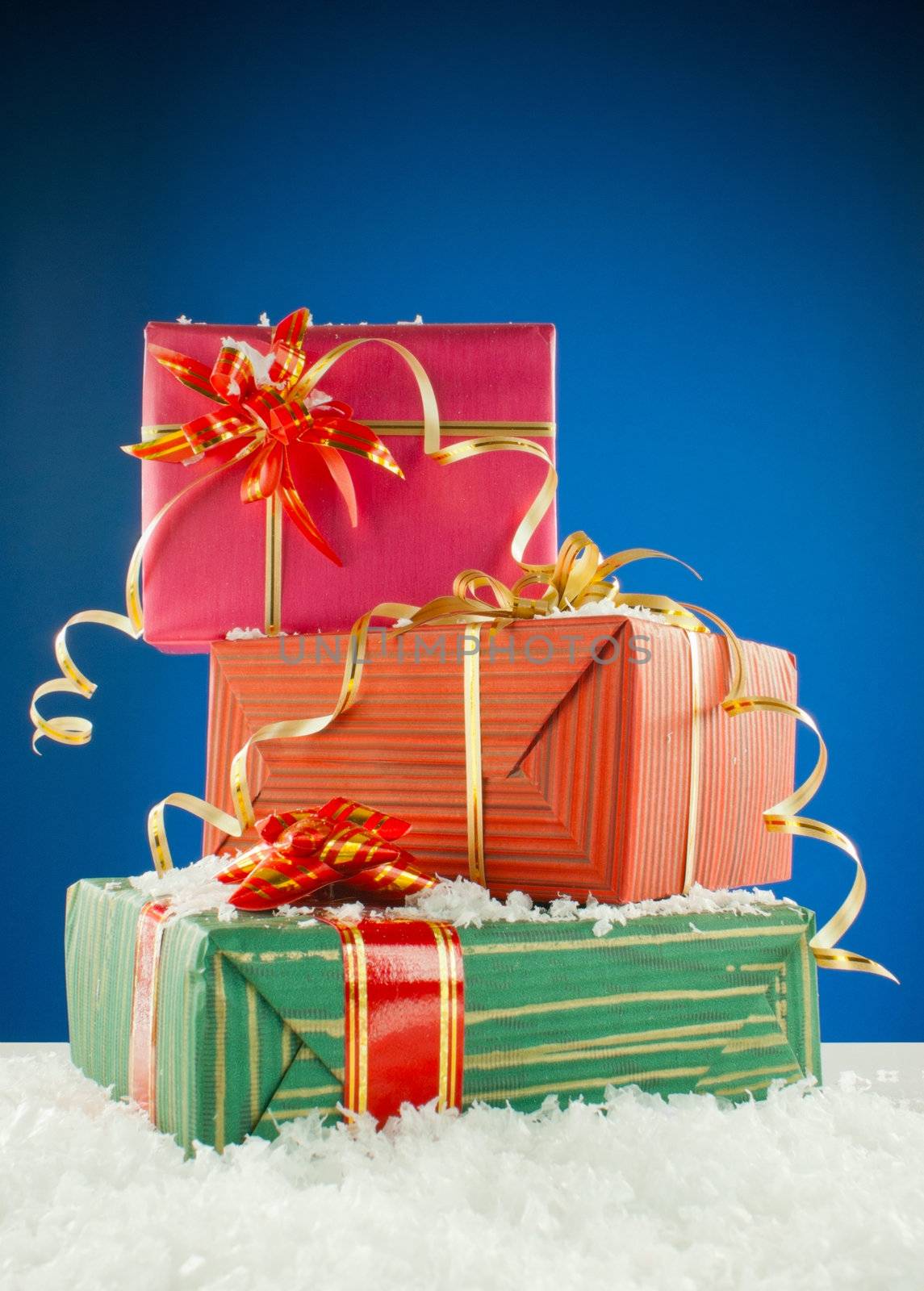 Christmas presents against blue background