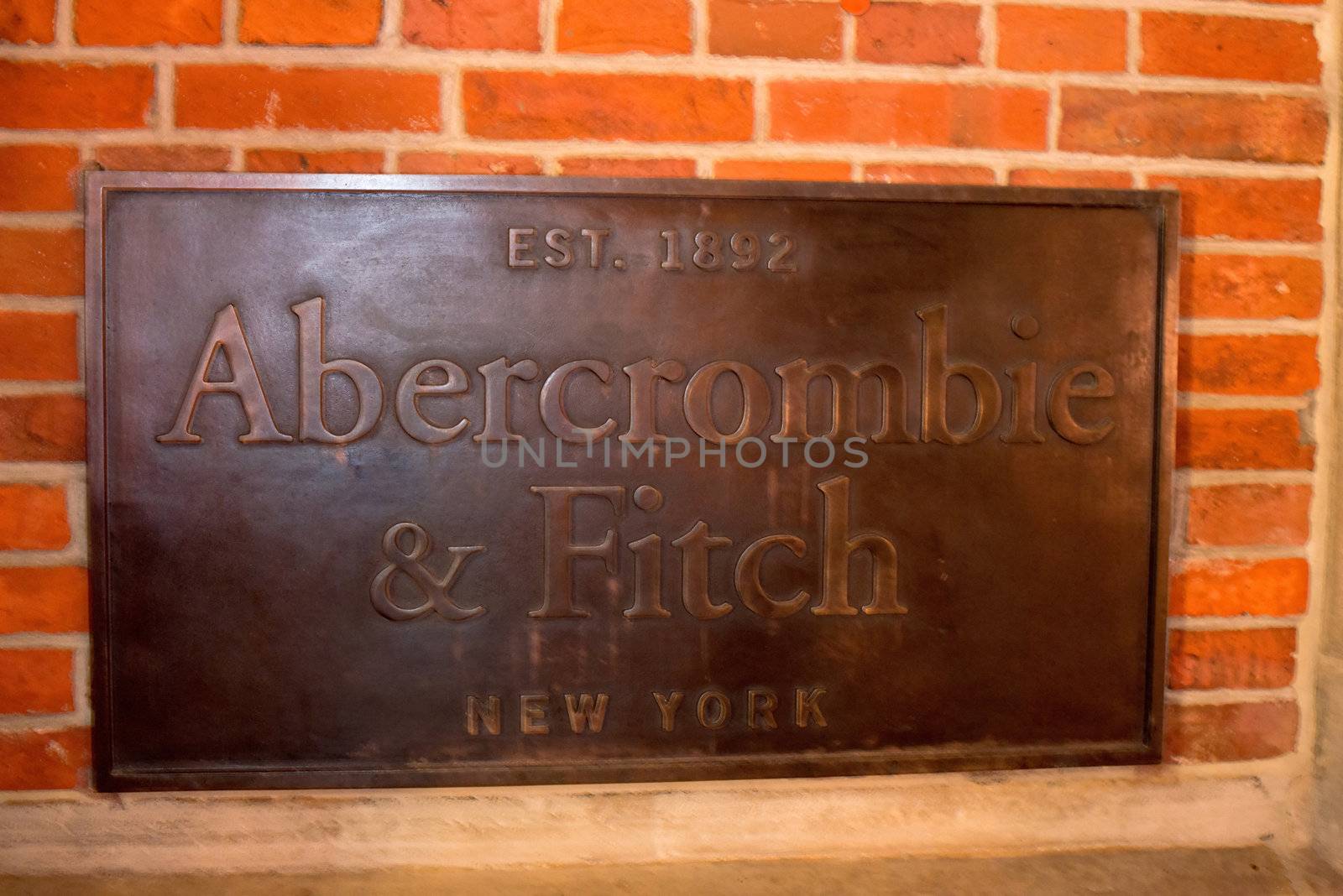 HAMBURG - DECEMBER 1, 2012: Plaque at the entrance of the newly opened Abercrombie & Fitch flagship store on December 1, 2012 in Hamburg Germany. Abercrombie & Fitch was founded 1892 in New Albany in the US and currently runs more than 1.000 stores worldwide including their second brand Hollister.