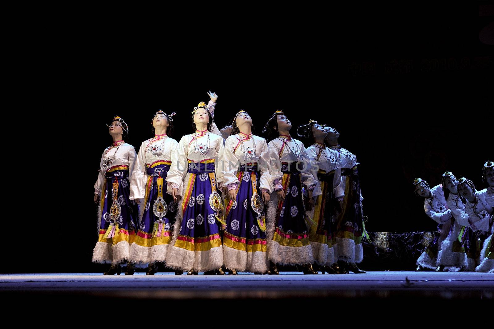 CHENGDU - SEP 28: chinese Tibetan ethnic dancers perform on stage in the 6th Sichuan minority nationality culture festival at JINJIANG theater.Sep 28,2010 in Chengdu, China.