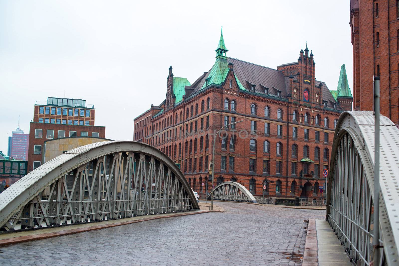 HAMBURG - DECEMBER 2, 2012: Beautiful warehouses in the traditional harbor area on December 2, 2012 in Hamburg Germany. The buildings in Hamburg harbor were built starting 1883 and are responsible for the traditional appearance of the area that is now converted into a modern office and resident area.