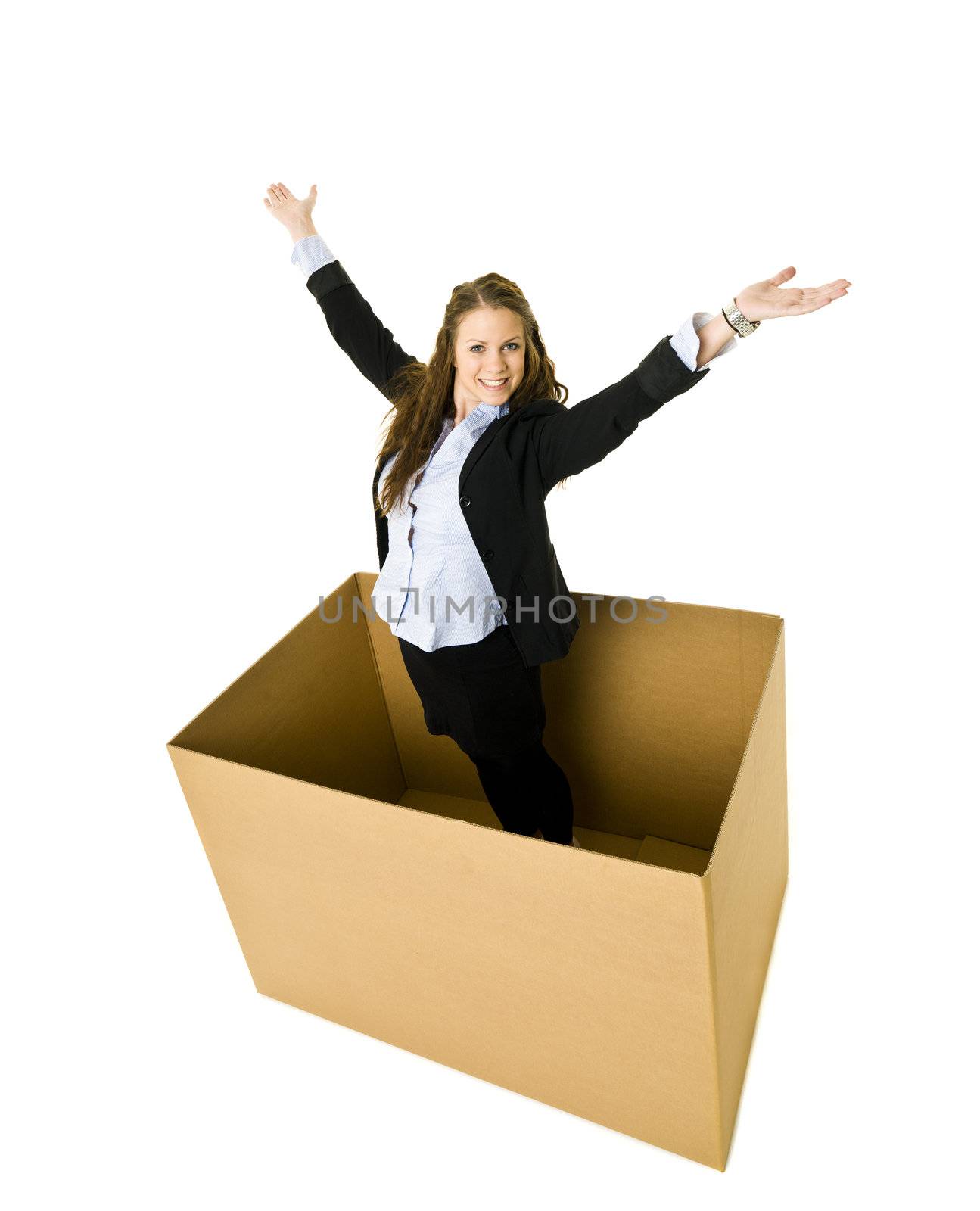 Happy Woman in a cardboard box isolated on white background