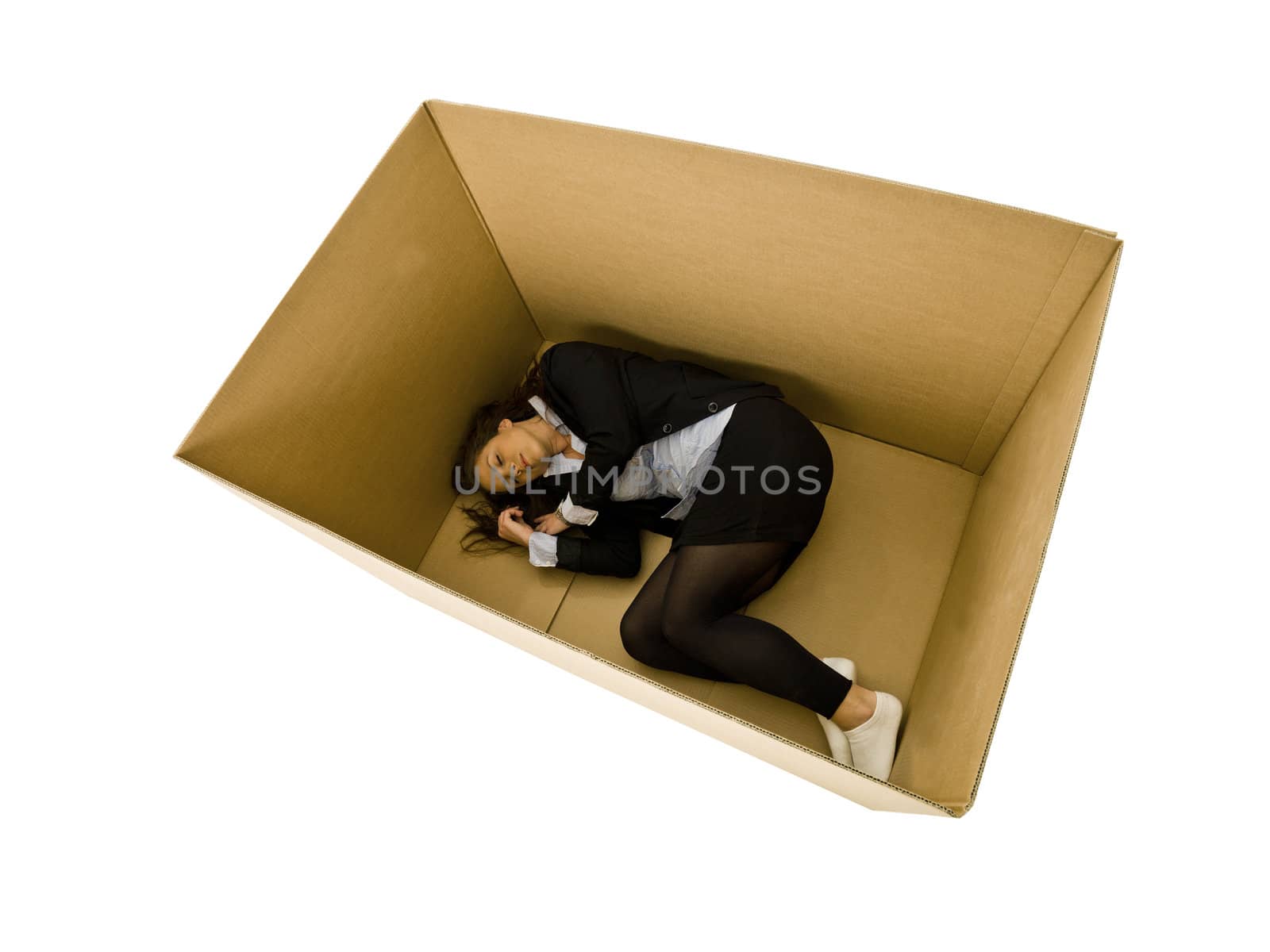 Woman sleeping in a cardboard box isolated on white background