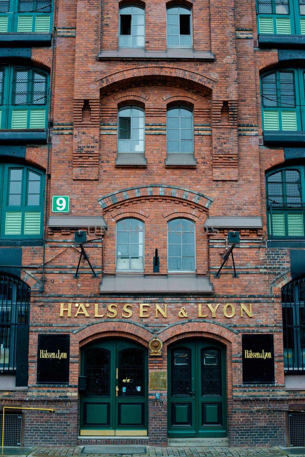 HAMBURG - DECEMBER 2, 2012: Beautiful warehouse of tea merchants Haelssen & Lyon in the traditional harbor area on December 2, 2012 in Hamburg Germany. The buildings in Hamburg harbor were built starting 1883 and are responsible for the traditional appearance of the area that is now converted into a modern office and resident area.