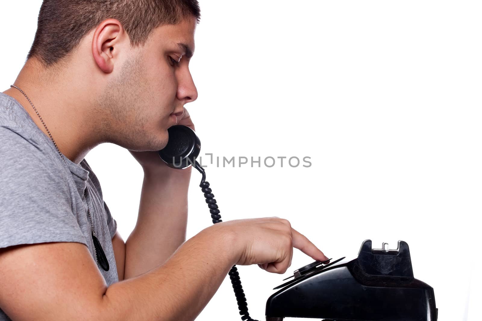 Man Dialing Old Rotary Telephone by graficallyminded