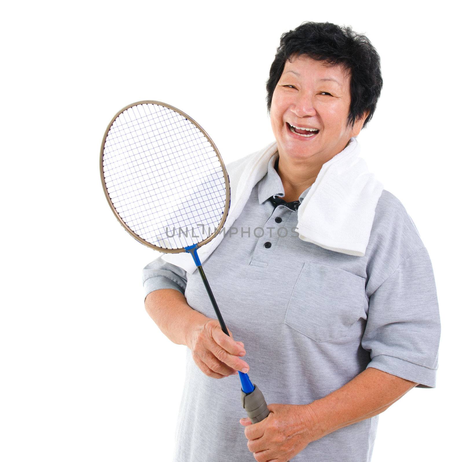Asian senior woman healthy lifestyle. Happy Asian grandparent holding badminton racket isolated on white.