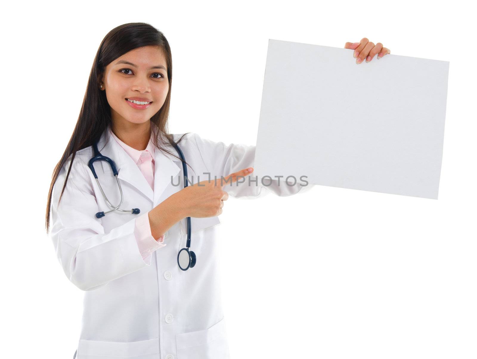 Southeast Asian female medical doctor showing white blank placard, isolated on white background.