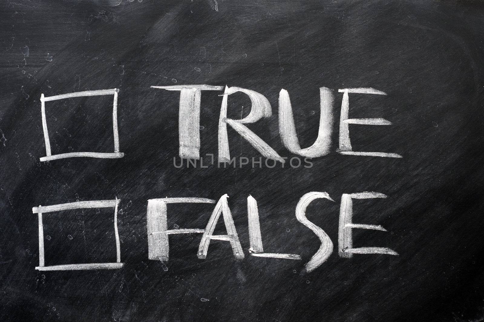 True and false check boxes written with chalk on a blackboard