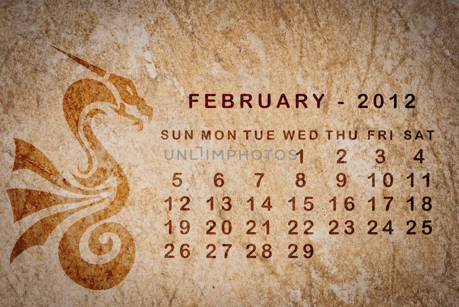 2012 year of the Dragon calendar on old vintage paper by sasilsolutions