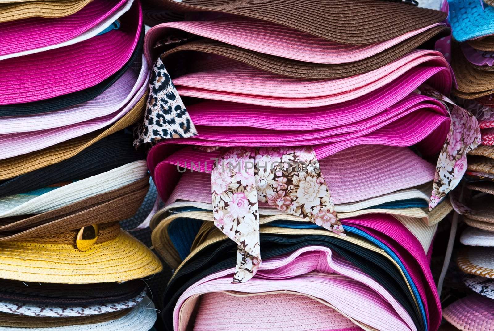 Stacks of colorful summer hats
 by sasilsolutions