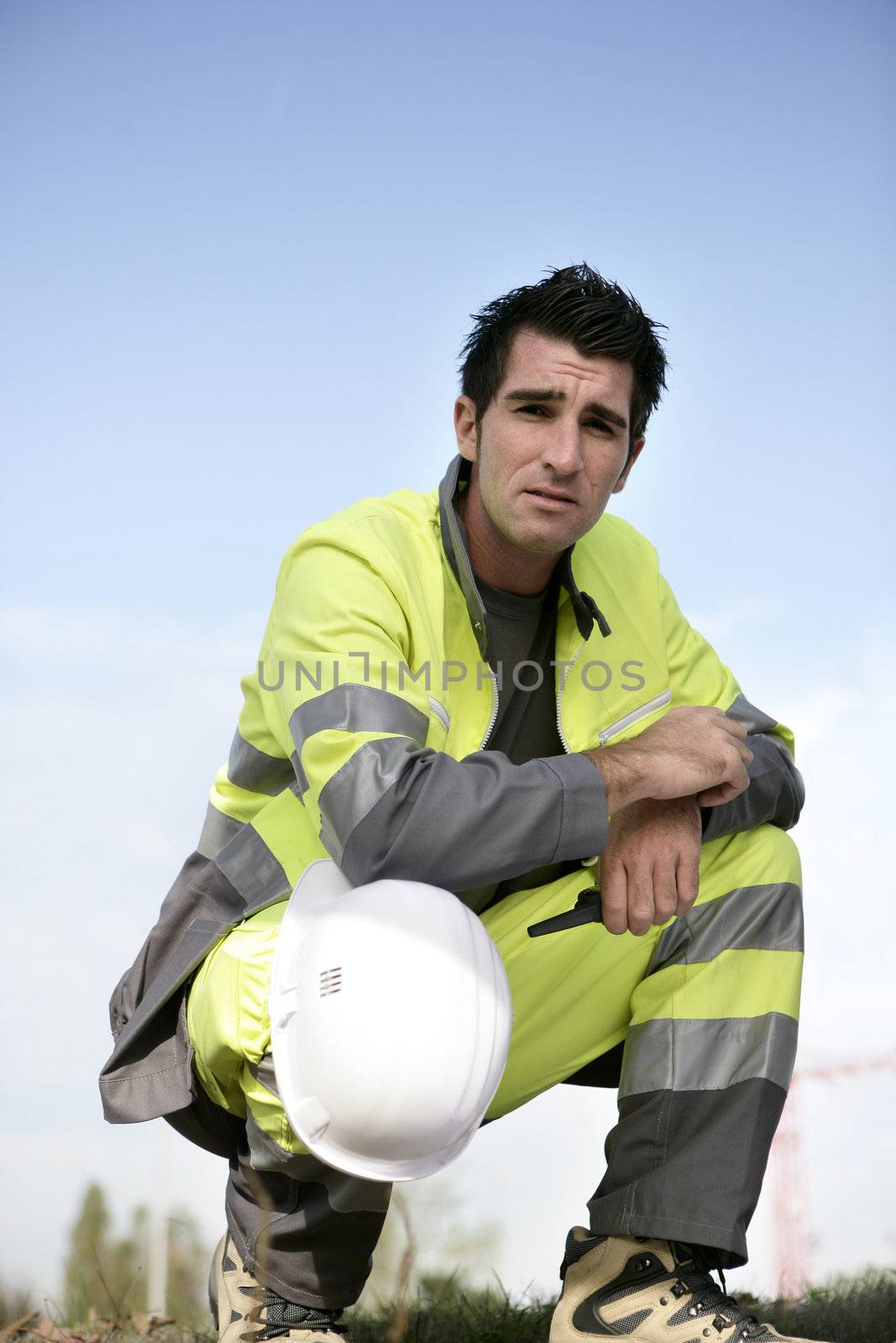 Man in high visibility clothing by phovoir