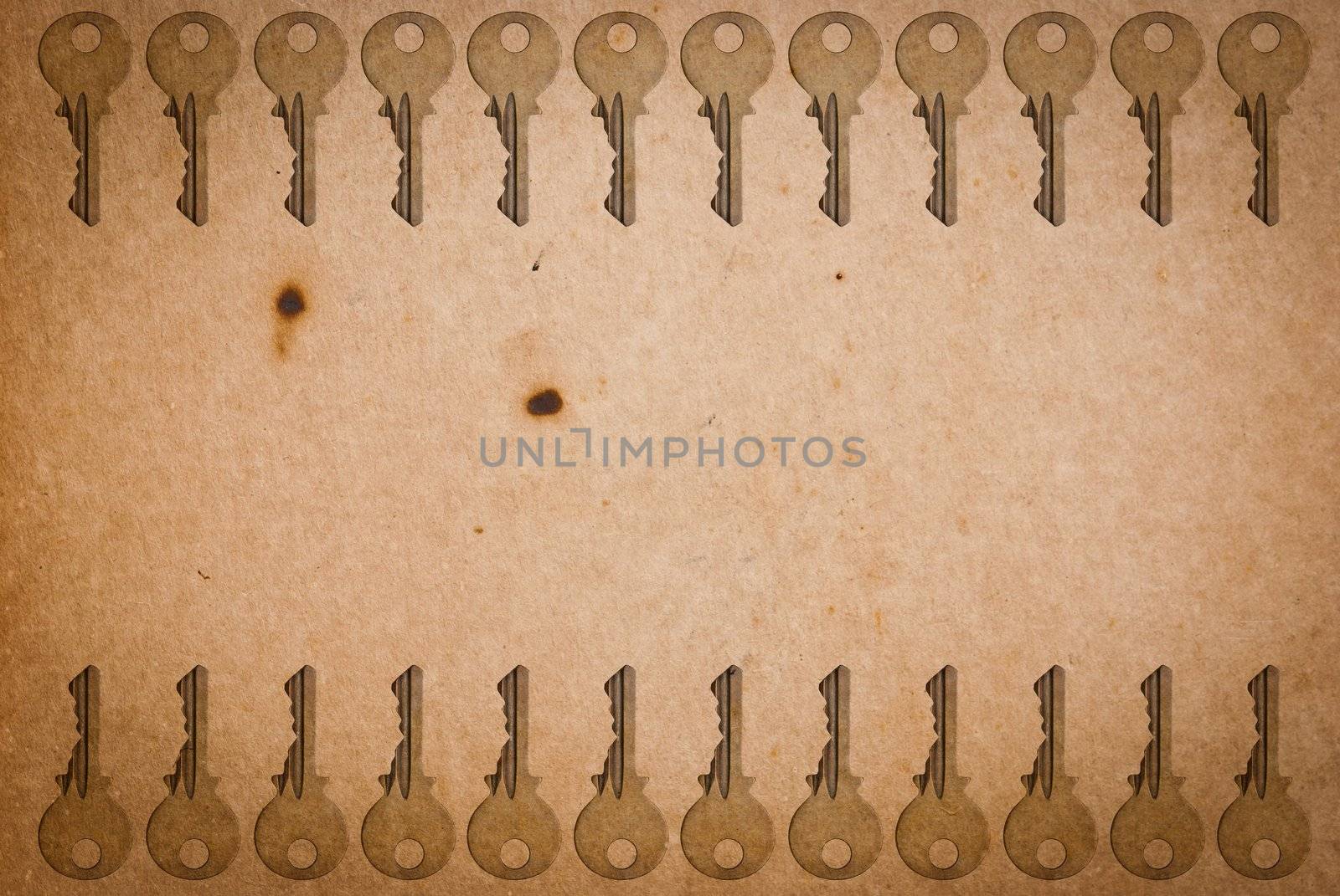 Rusty keys on old paper background with blended layers
