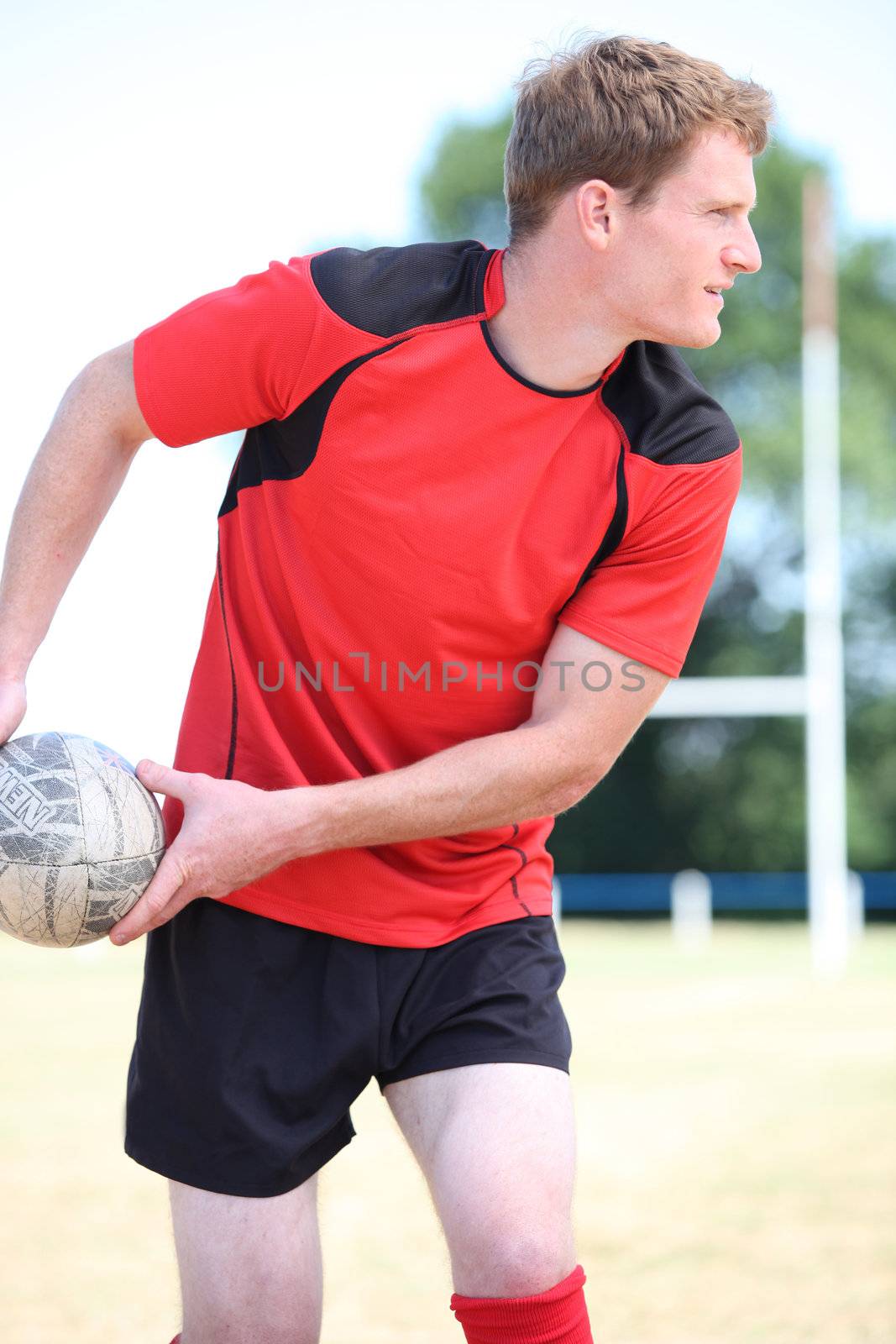 Rugby player passing ball