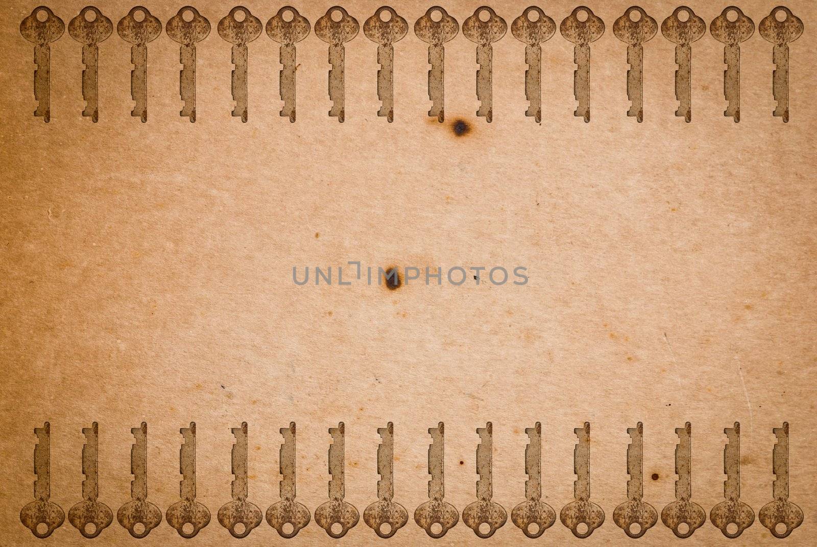 Rusty keys on old paper background with blended layers
