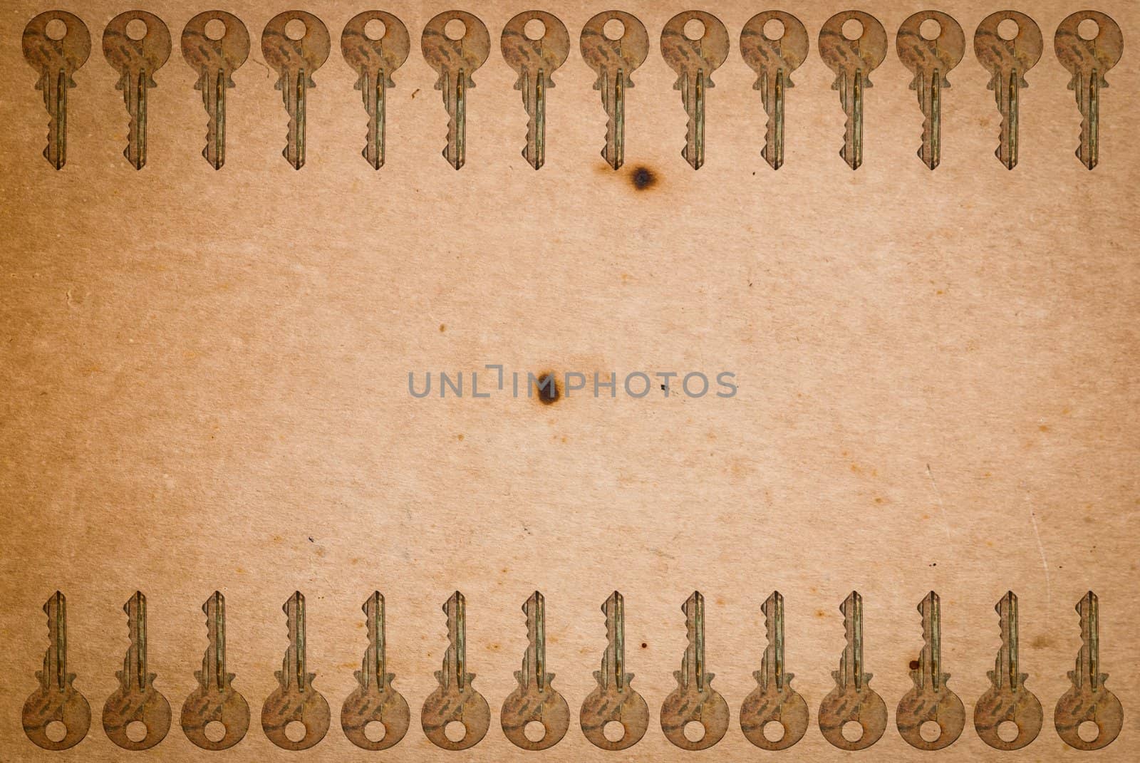 Rusty keys on old paper background with blended layers
