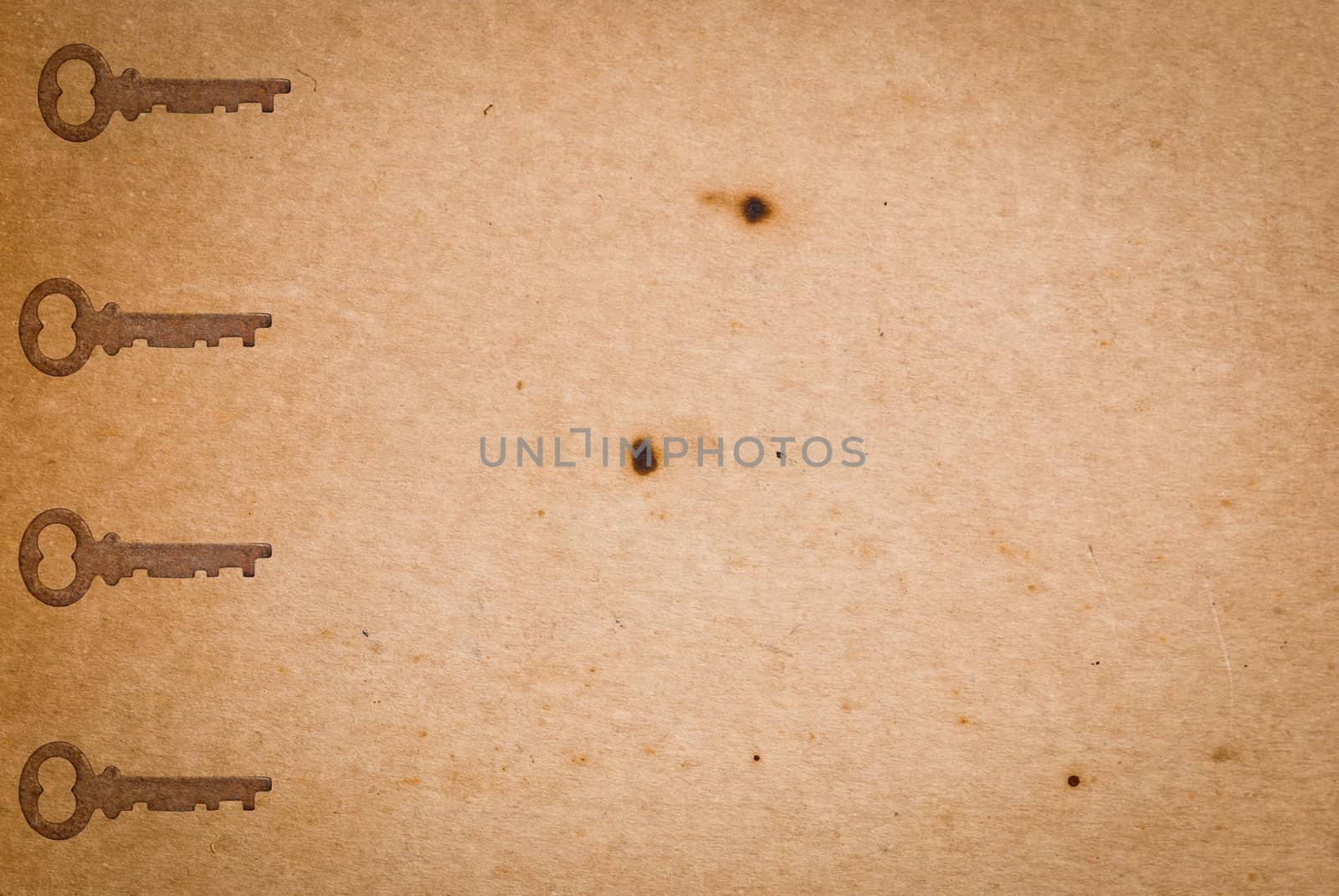 Rusty keys on old paper background by sasilsolutions