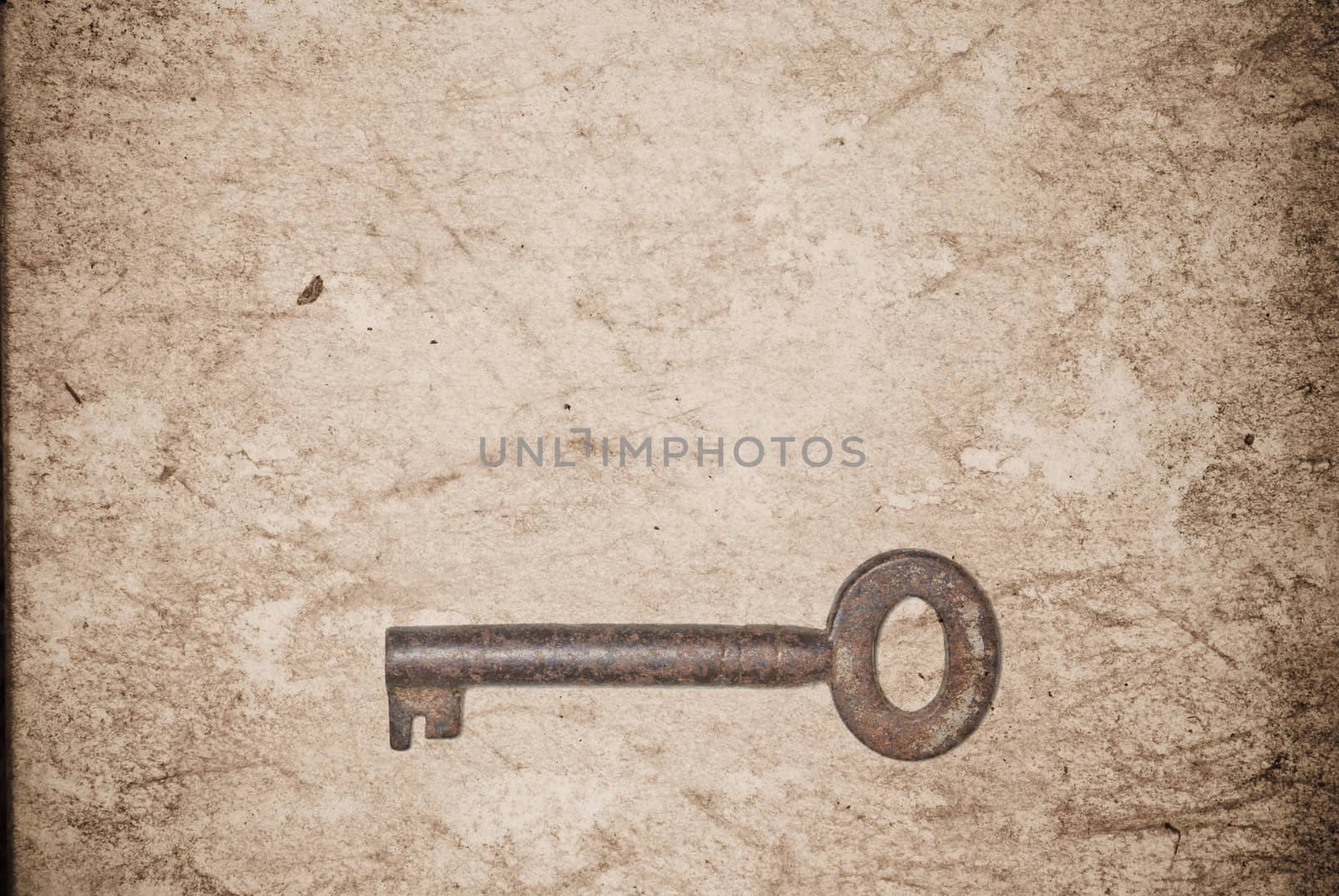 Rusty keys on old paper background with blended layers