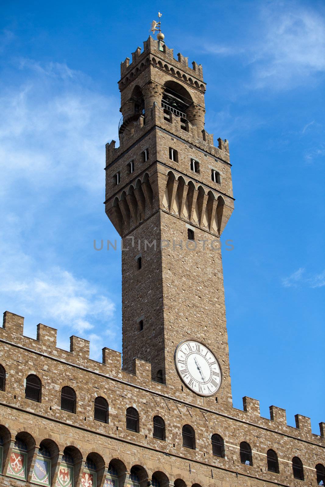 Front of Palazzo Vecchio and the clock tower on Piazza della Signoria, Florence, Tuscany