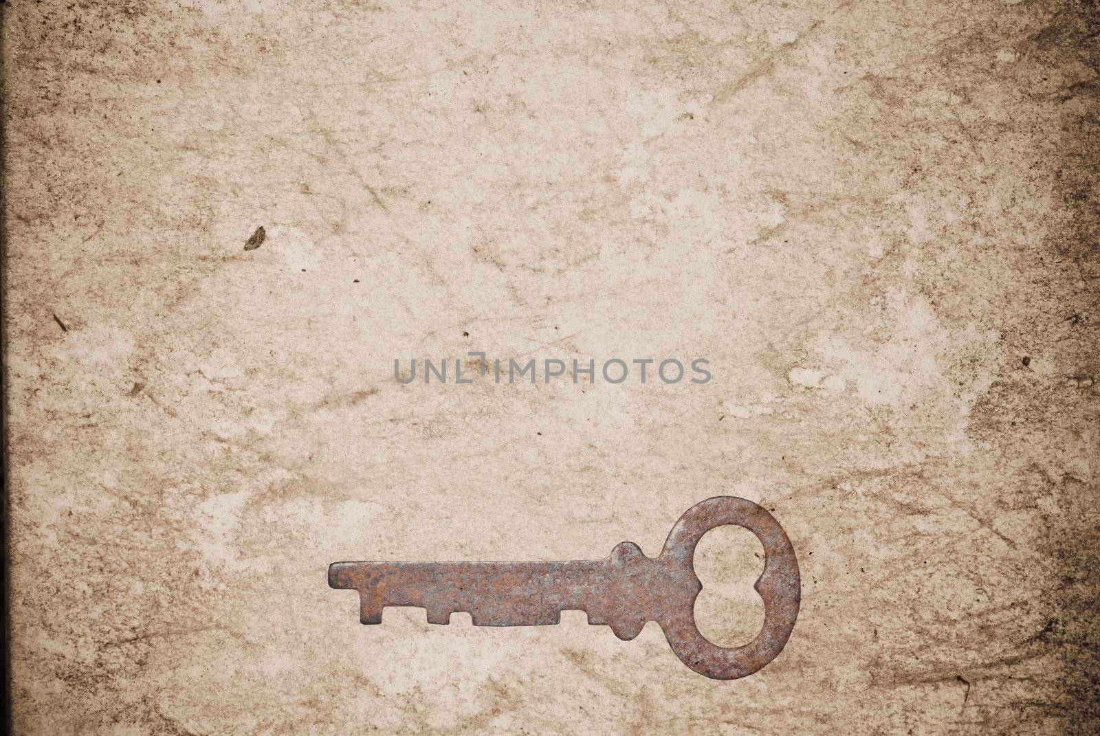 Rusty keys on old paper background with blended layers