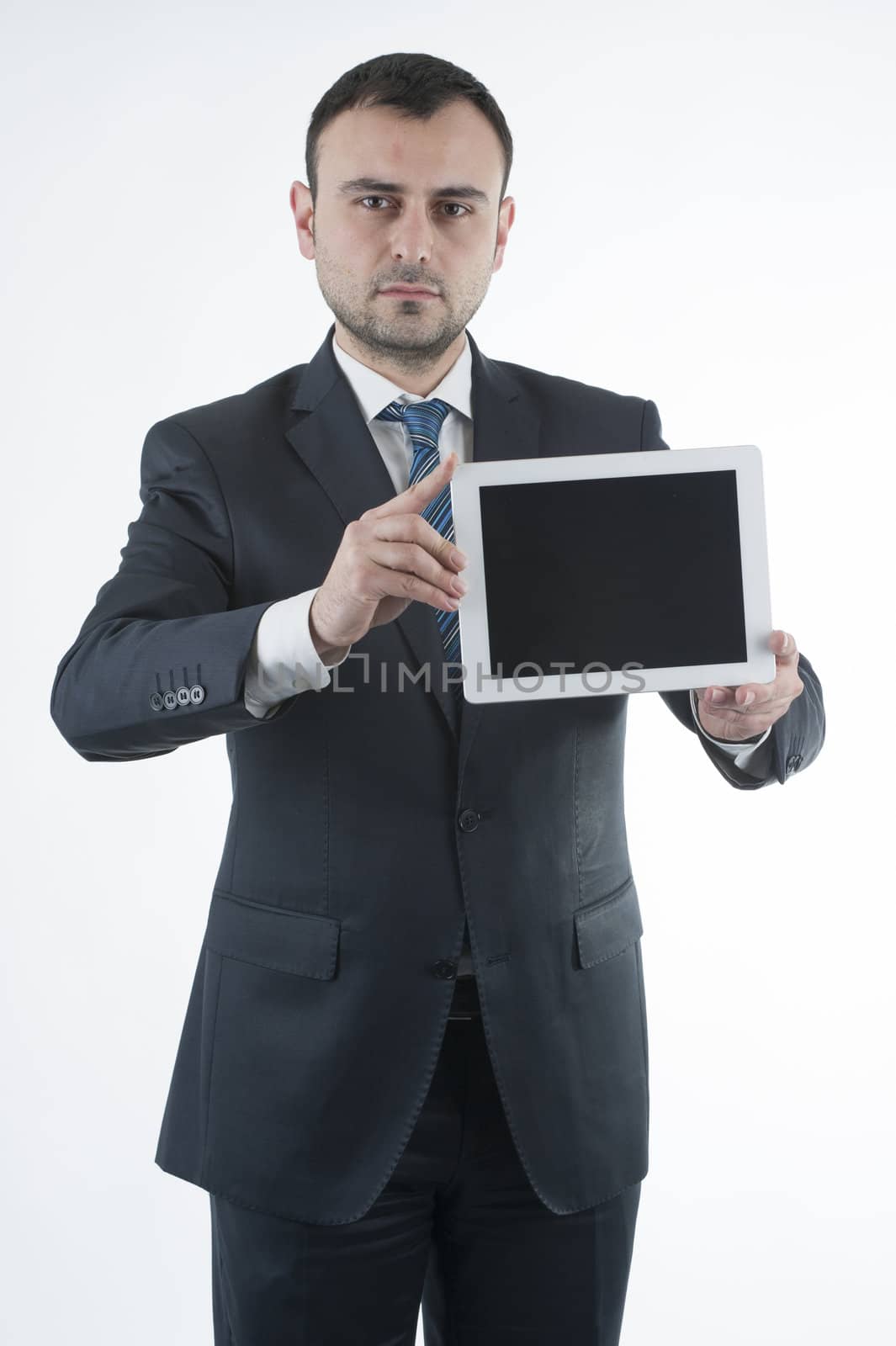 Businessman shows tablet