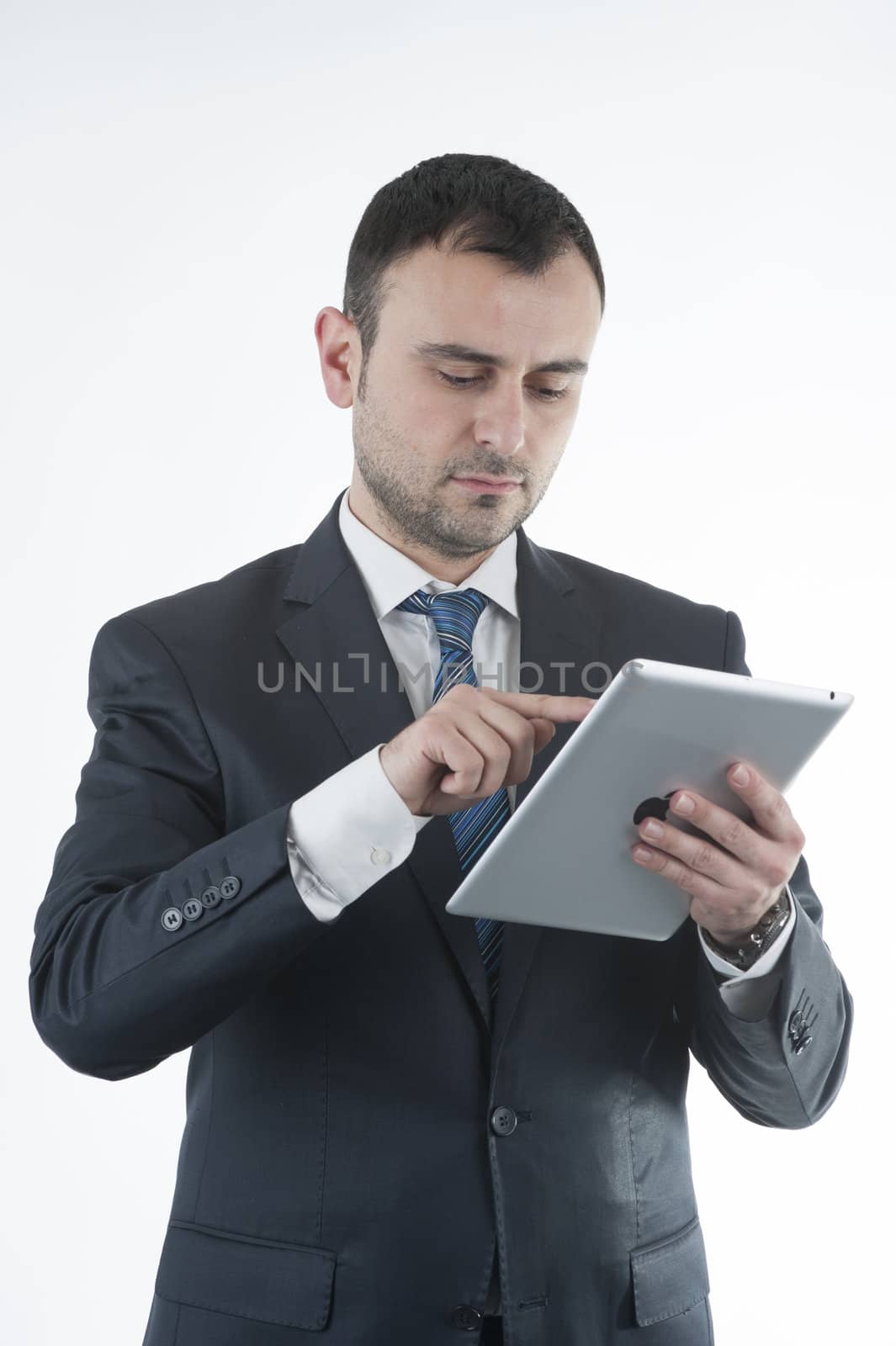 Businessman works with tablet