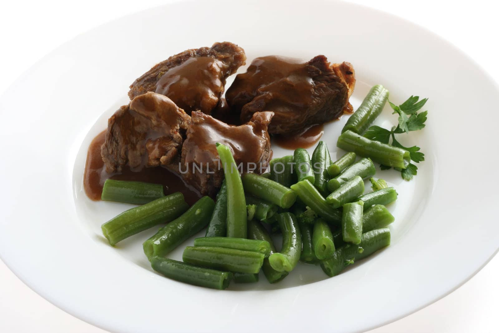 beef with sauce and beans