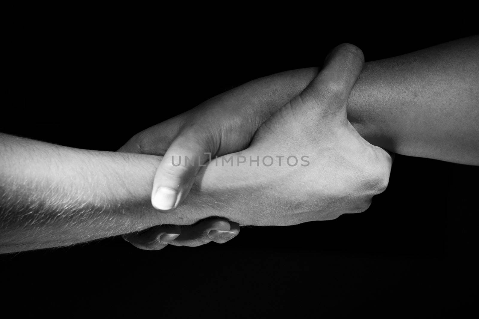 Two hands unite with eachother as friends greeting