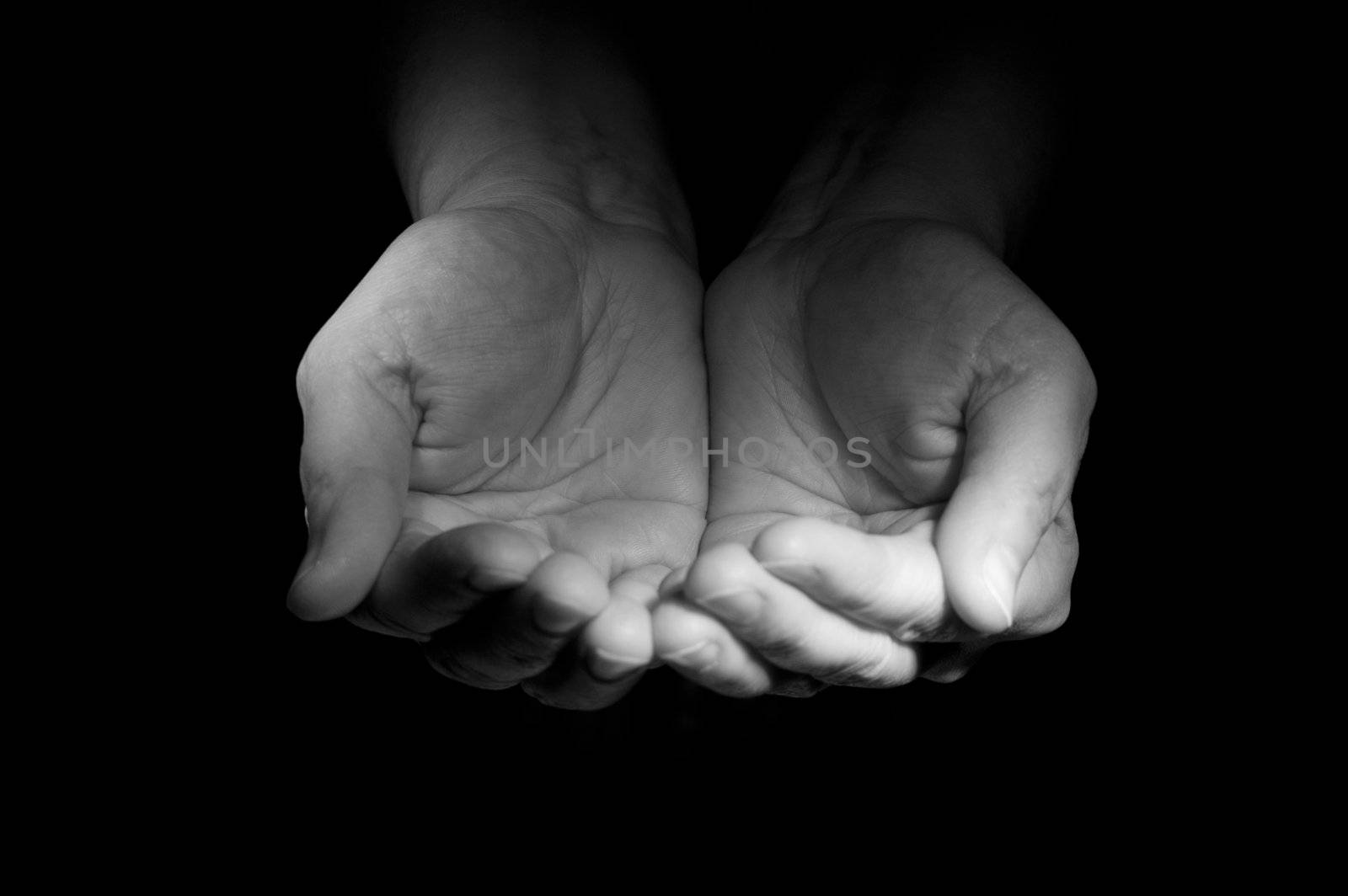 Two hands ask the charity from foto watcher
