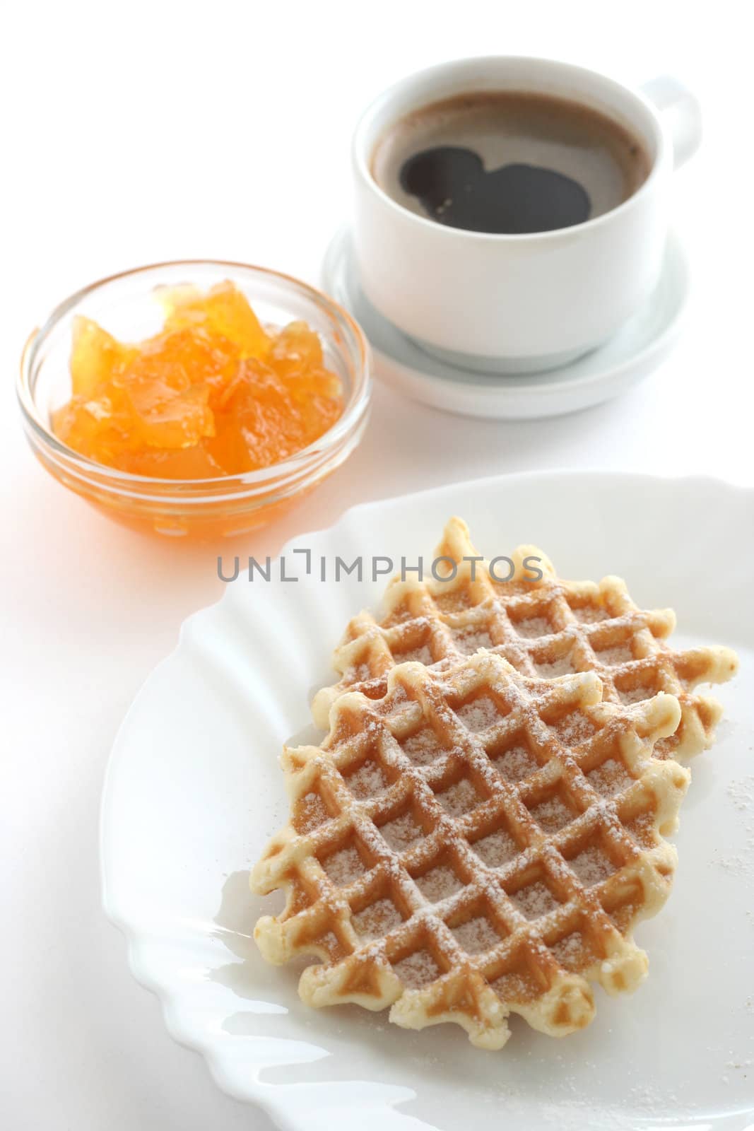 waffles with jam and a cup of coffe by nataliamylova