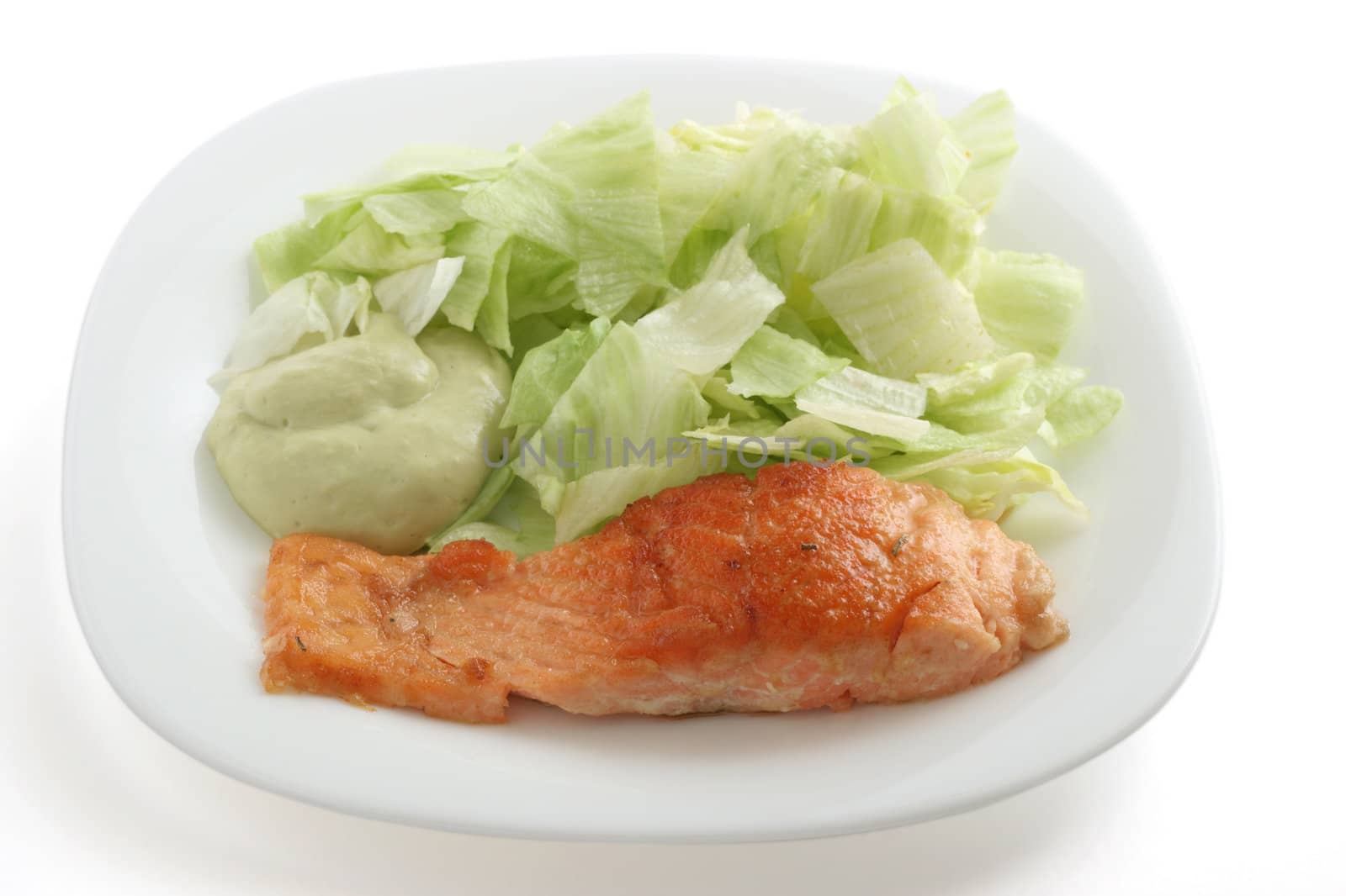 fried salmon with salad