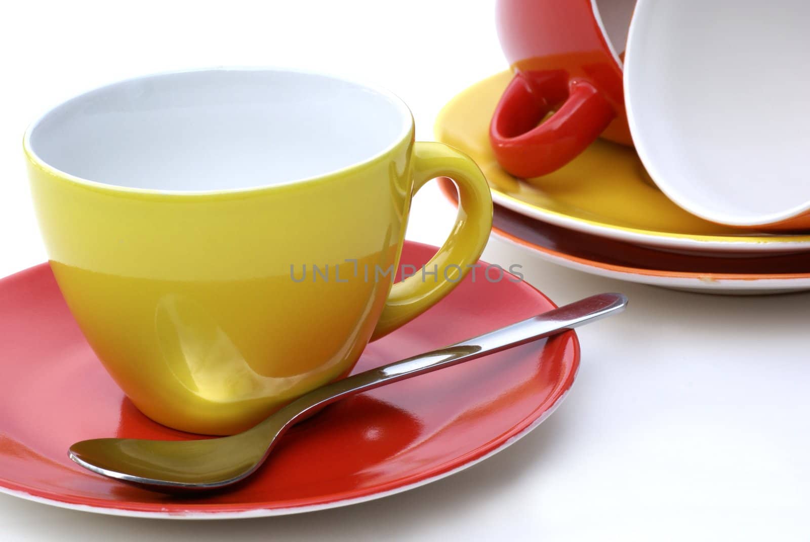 Cups and saucers in multiple colors.