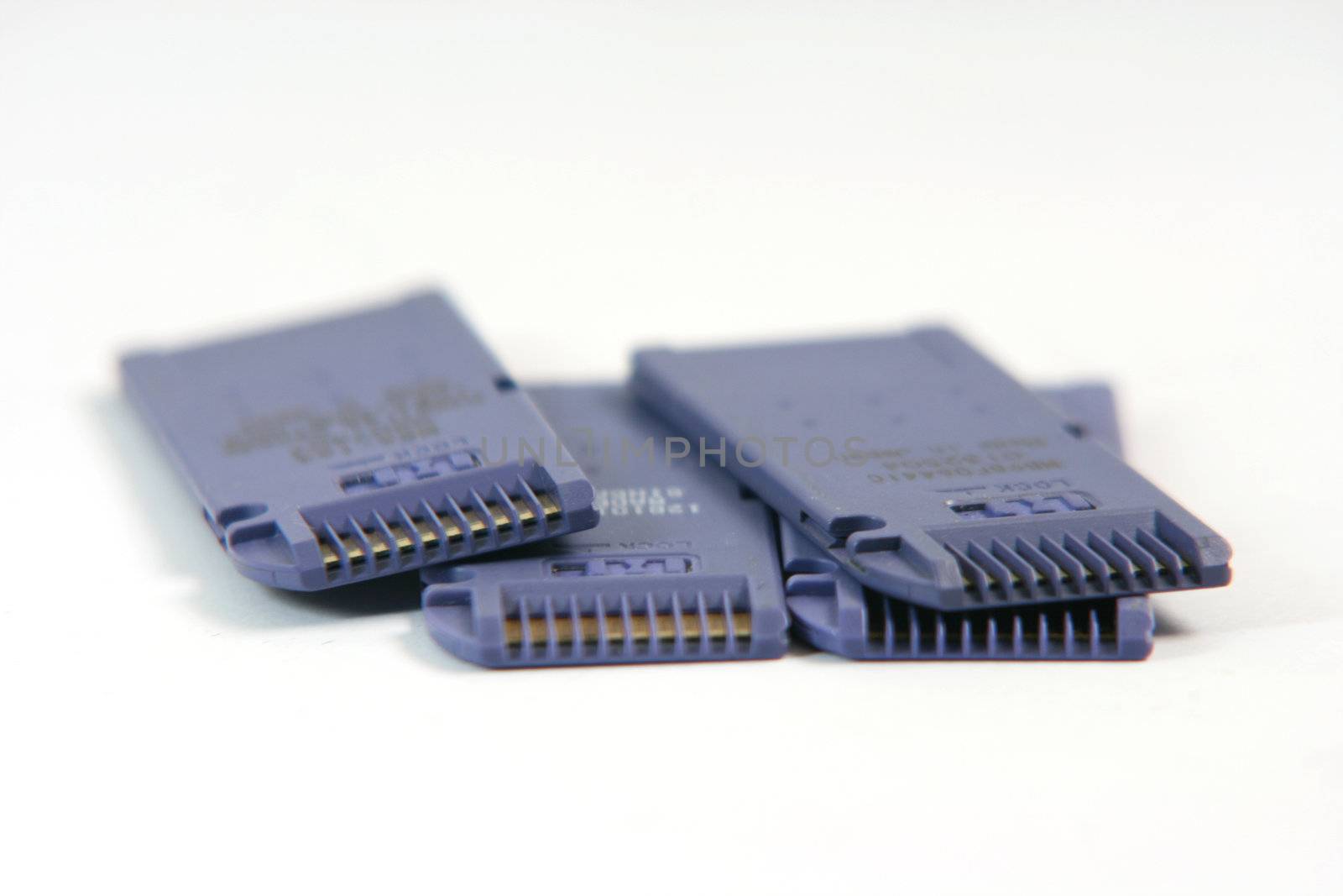 blue memory cards closeup in white background