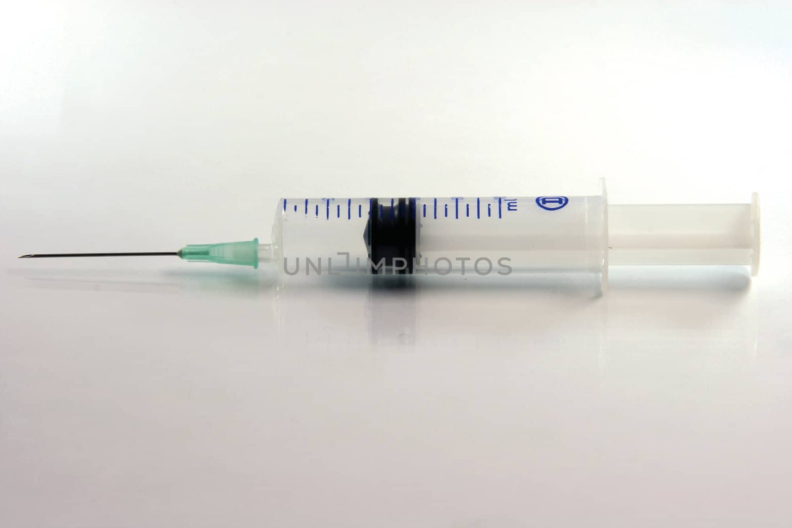 syringe and needle closeup medical concepts horizontal