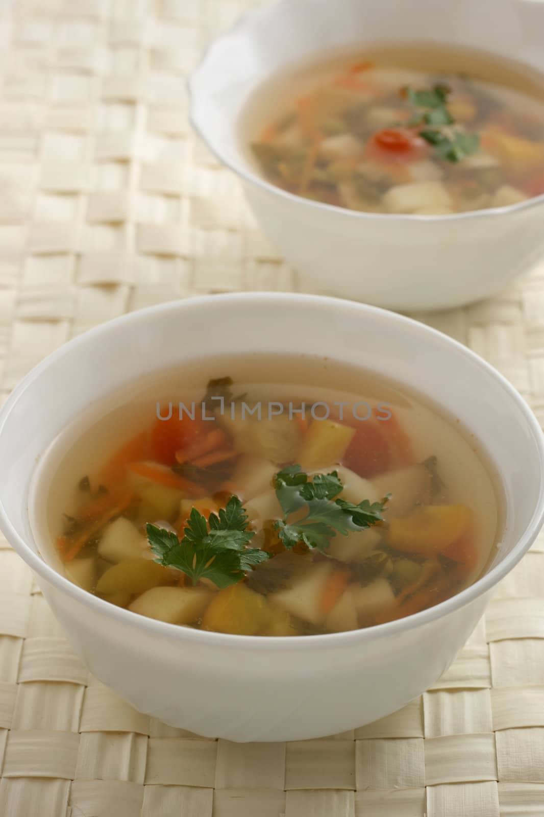 plates of vegetable soup by nataliamylova