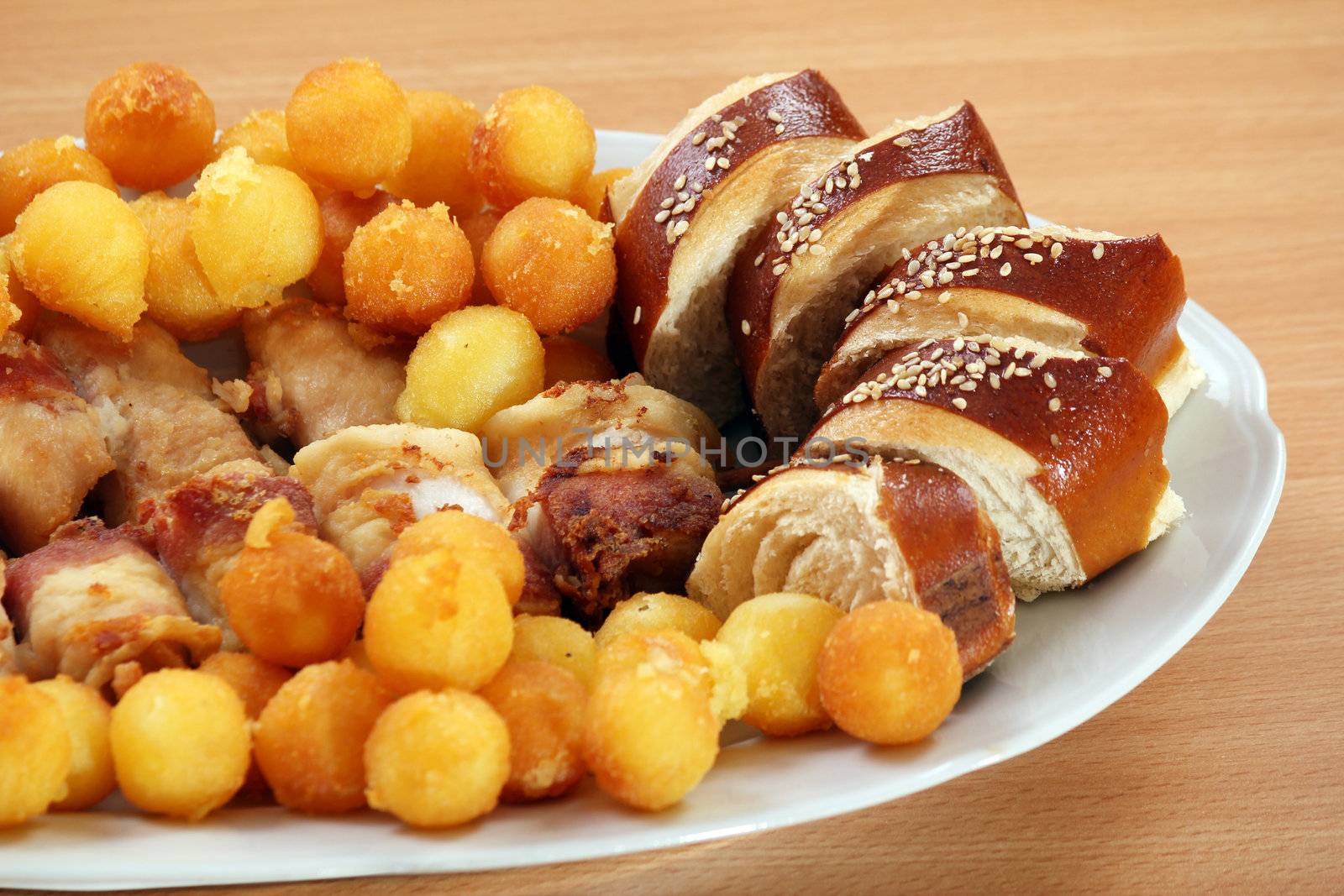 bread meat and potatoes on plate gourmet food