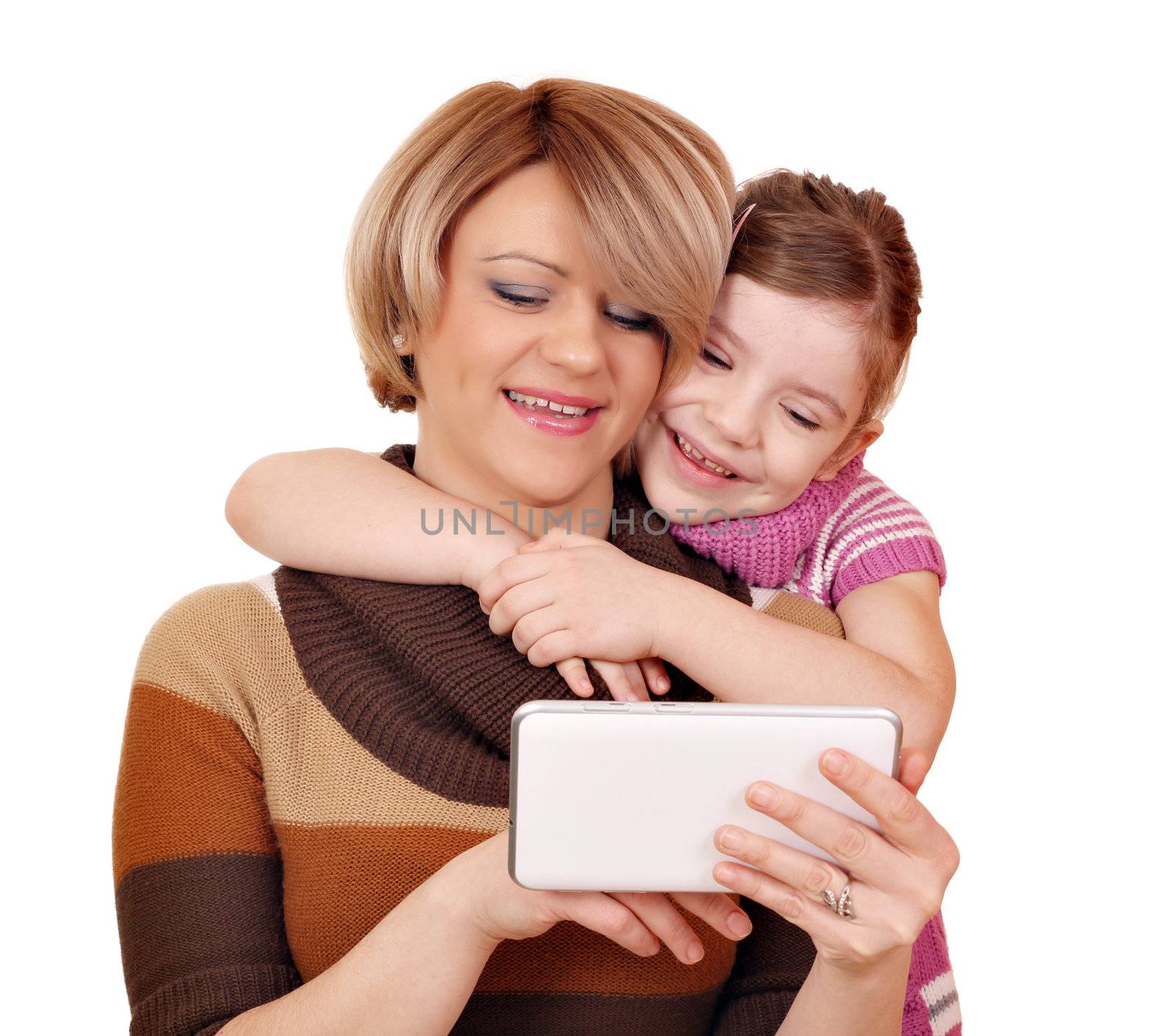 family mother and daughter play with tablet pc by goce