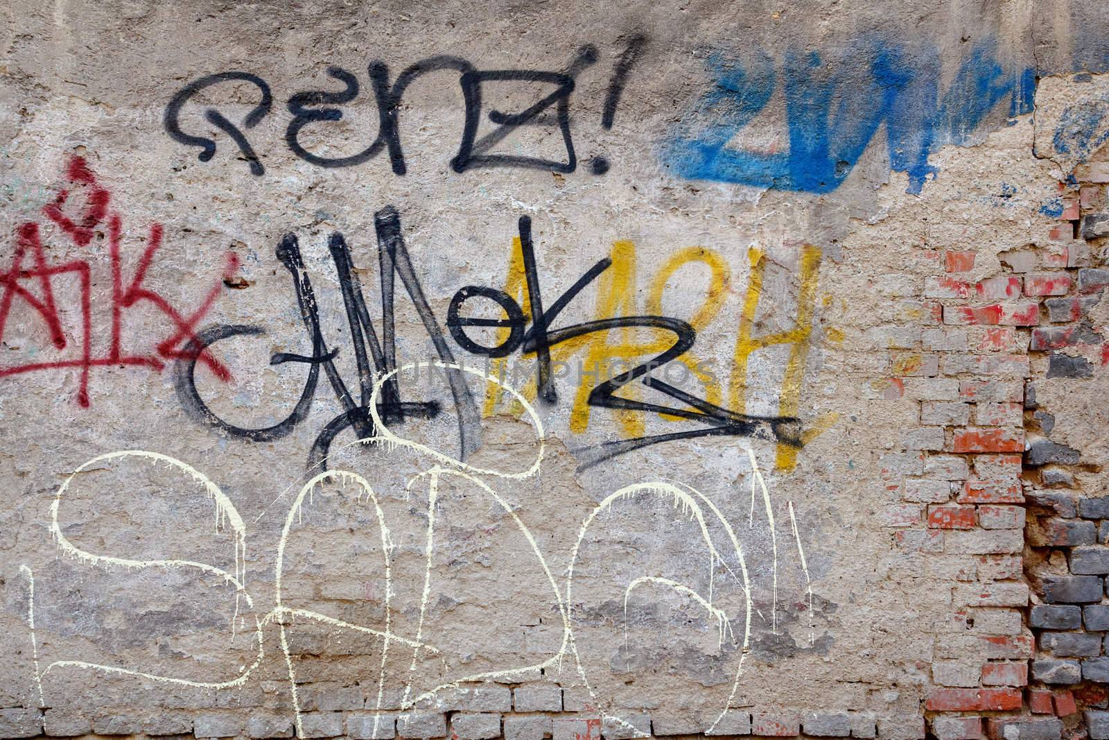 grunge background with graffiti elements on brick wall