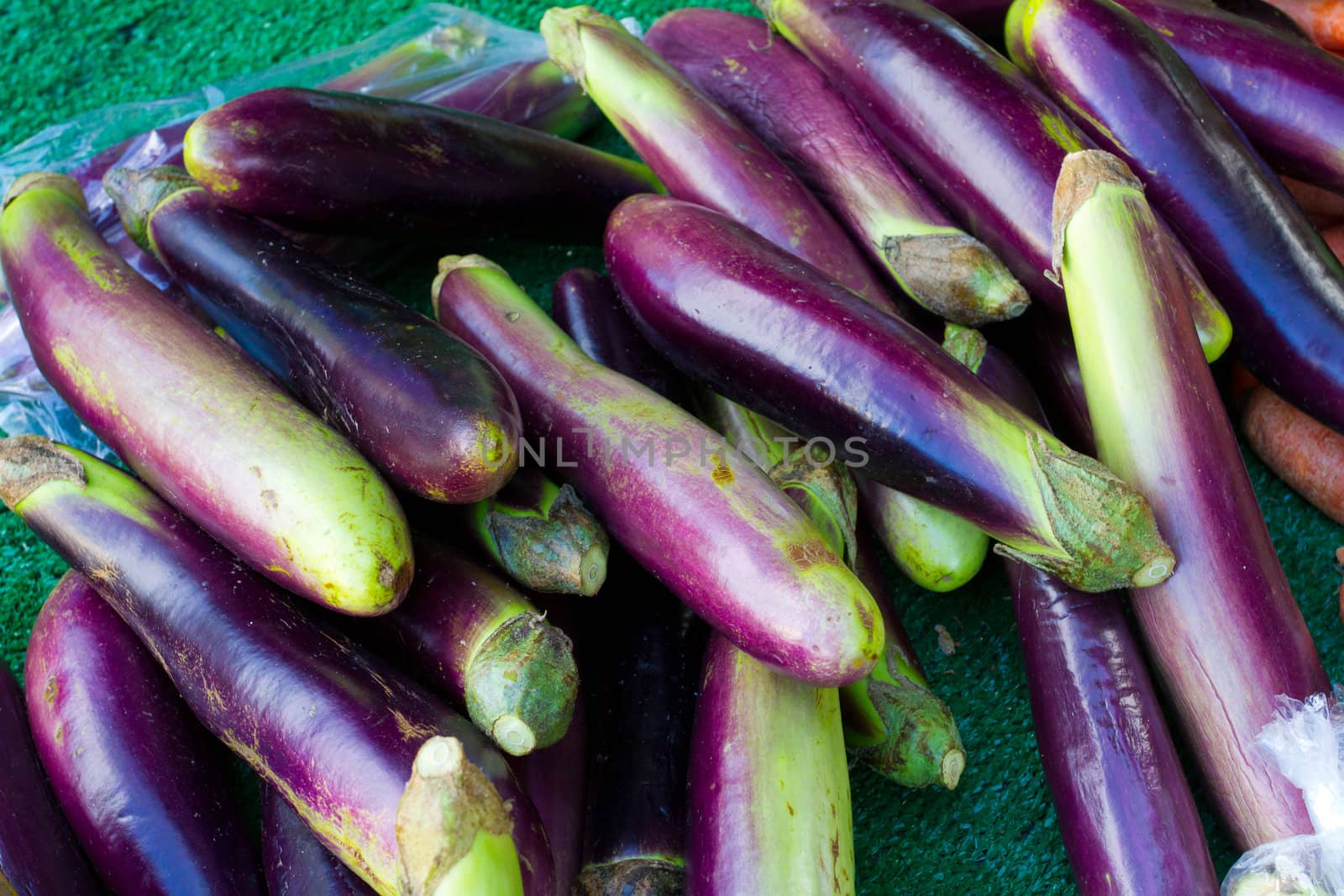 Images from a farmers market in Hawaii showing tropical fruits or vegetables in simple photos with vibrant colors.